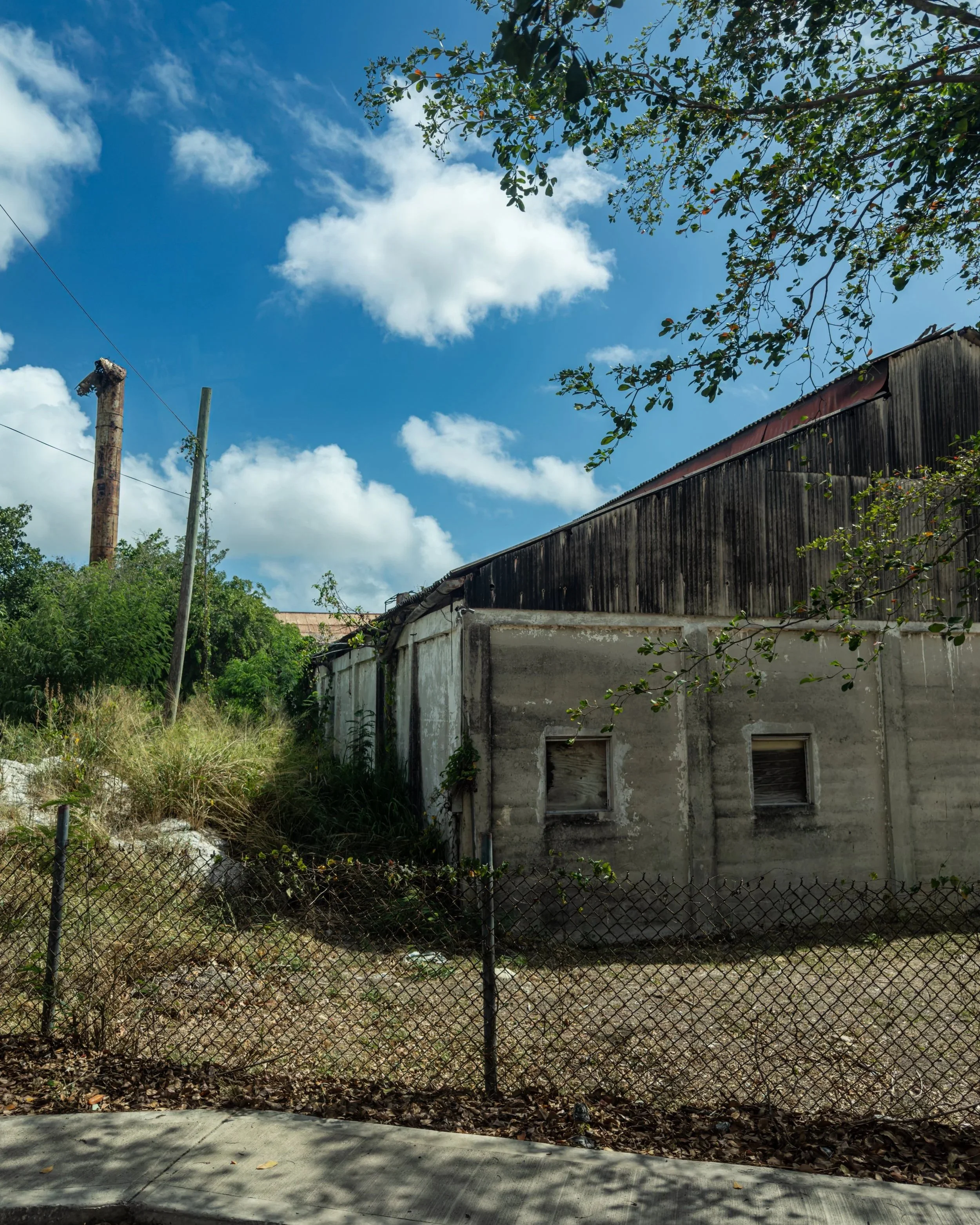 Road view of chimney and remains of Gunthorpe's Sugar Factory