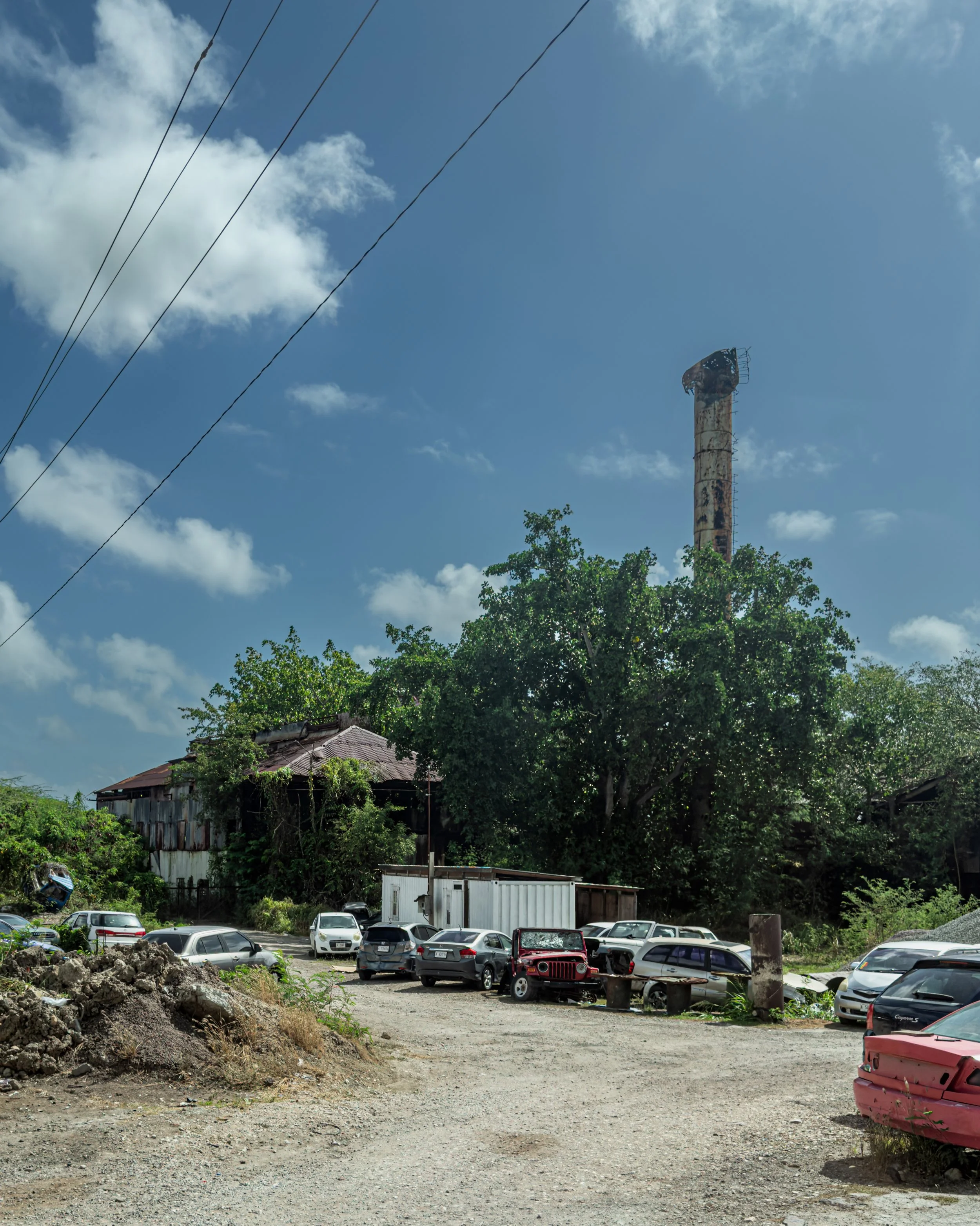 Road view of chimney and remains of Gunthorpe's Sugar Factory
