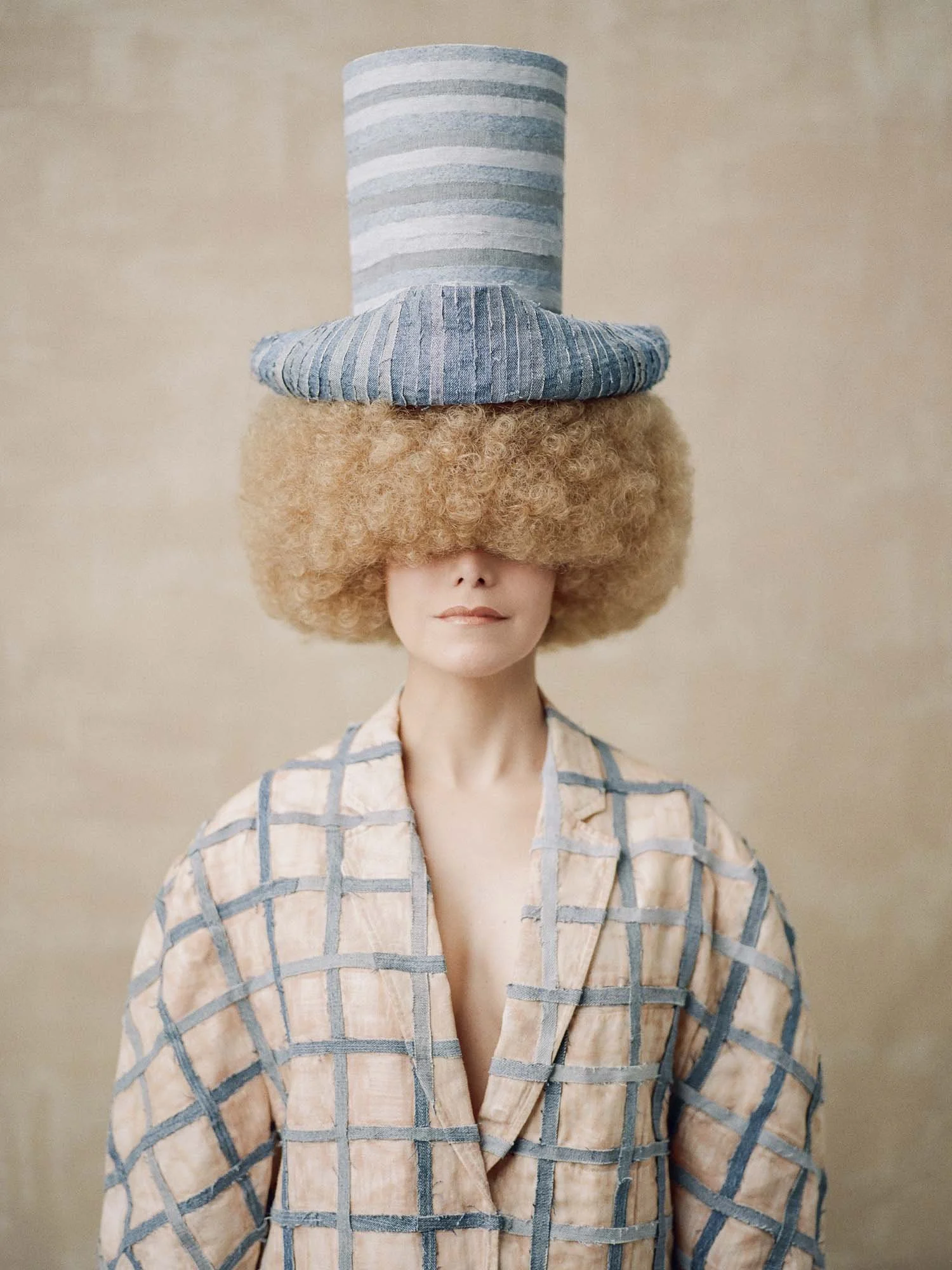 A quiet portrait where texture and structure come together through handcrafted elements, soft tones, and gentle geometry.