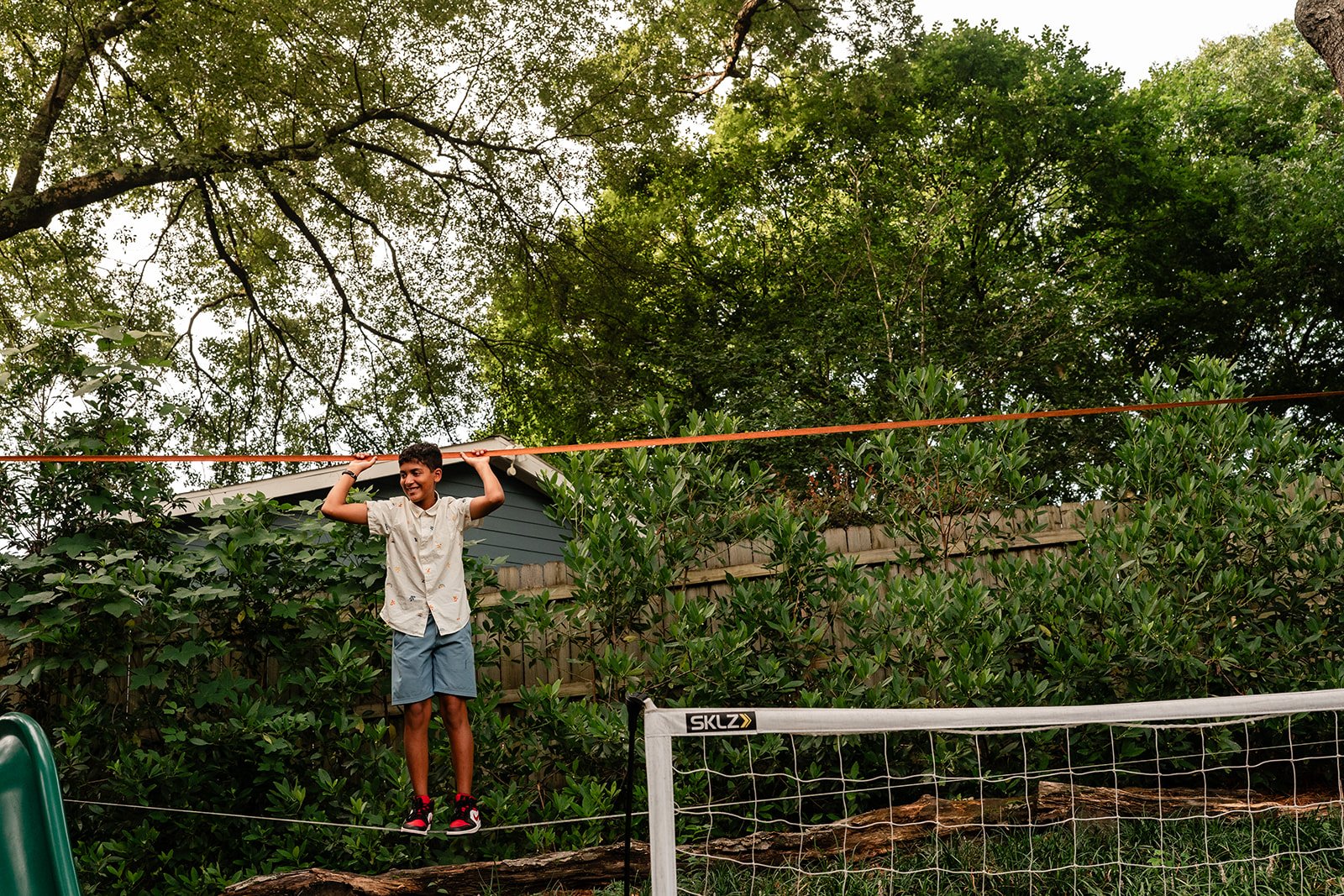Teenage boy on a rope walk