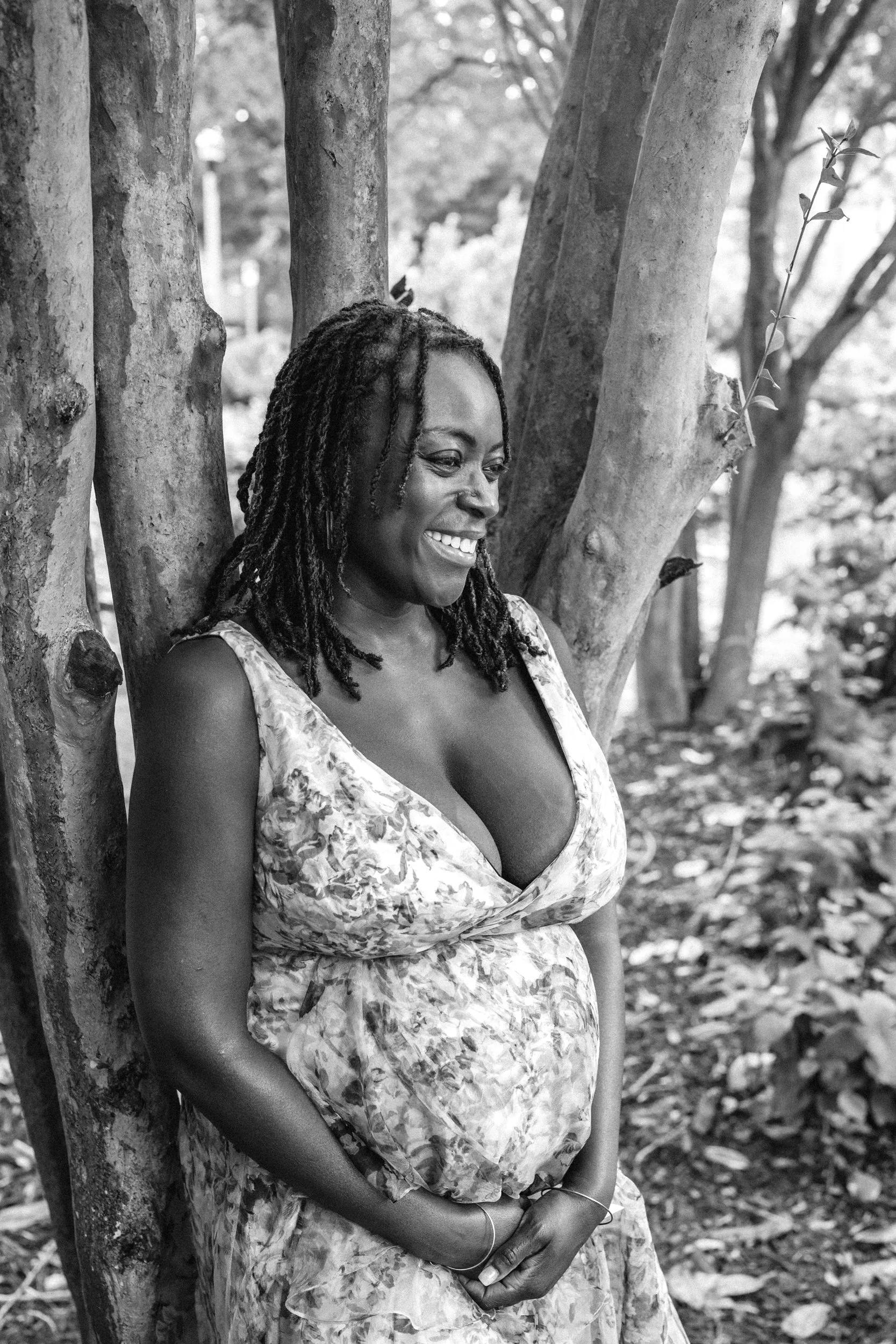 pregnant mother smiling at a park in Decatur