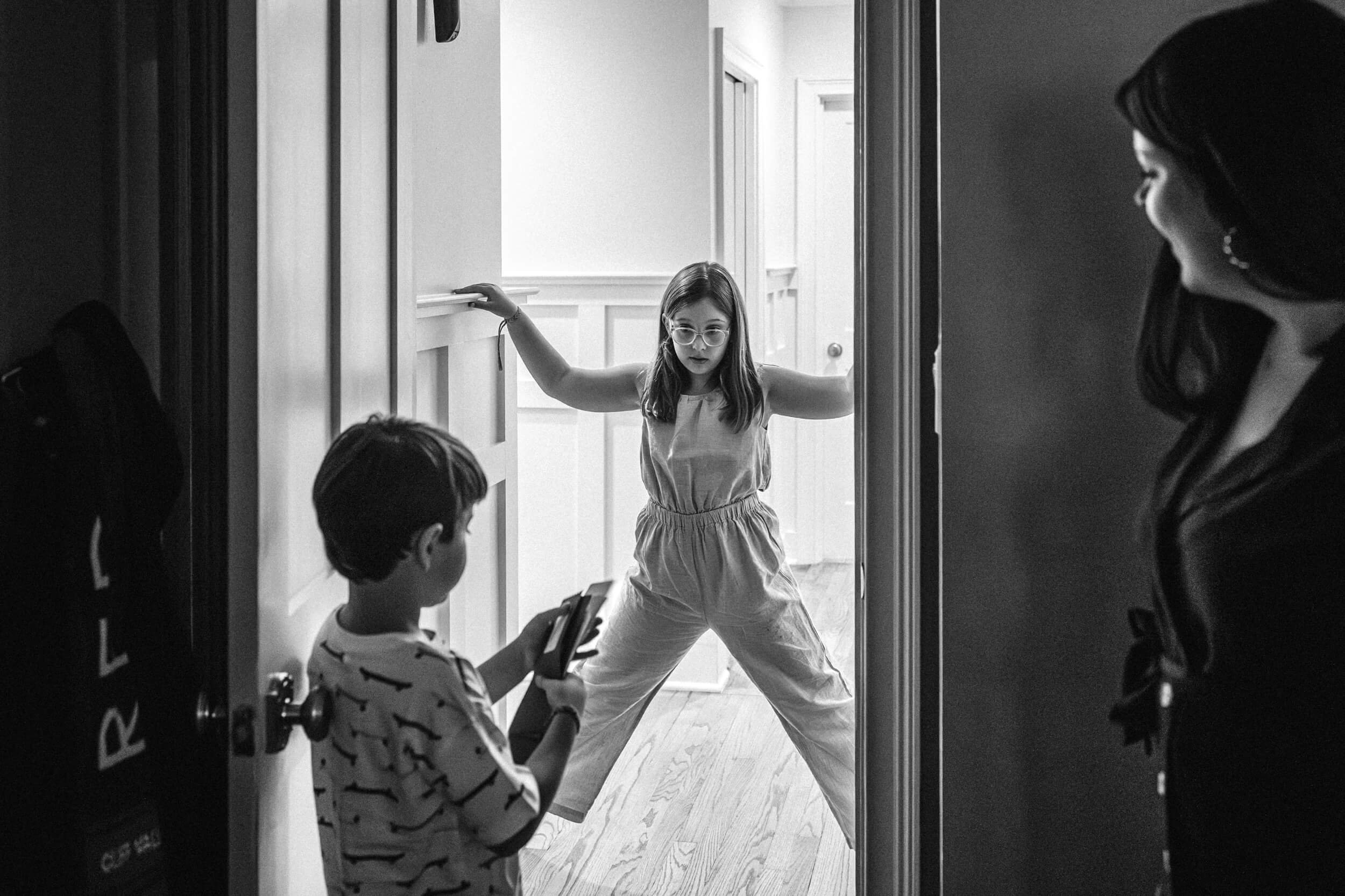 family in the hallway of their Decatur home