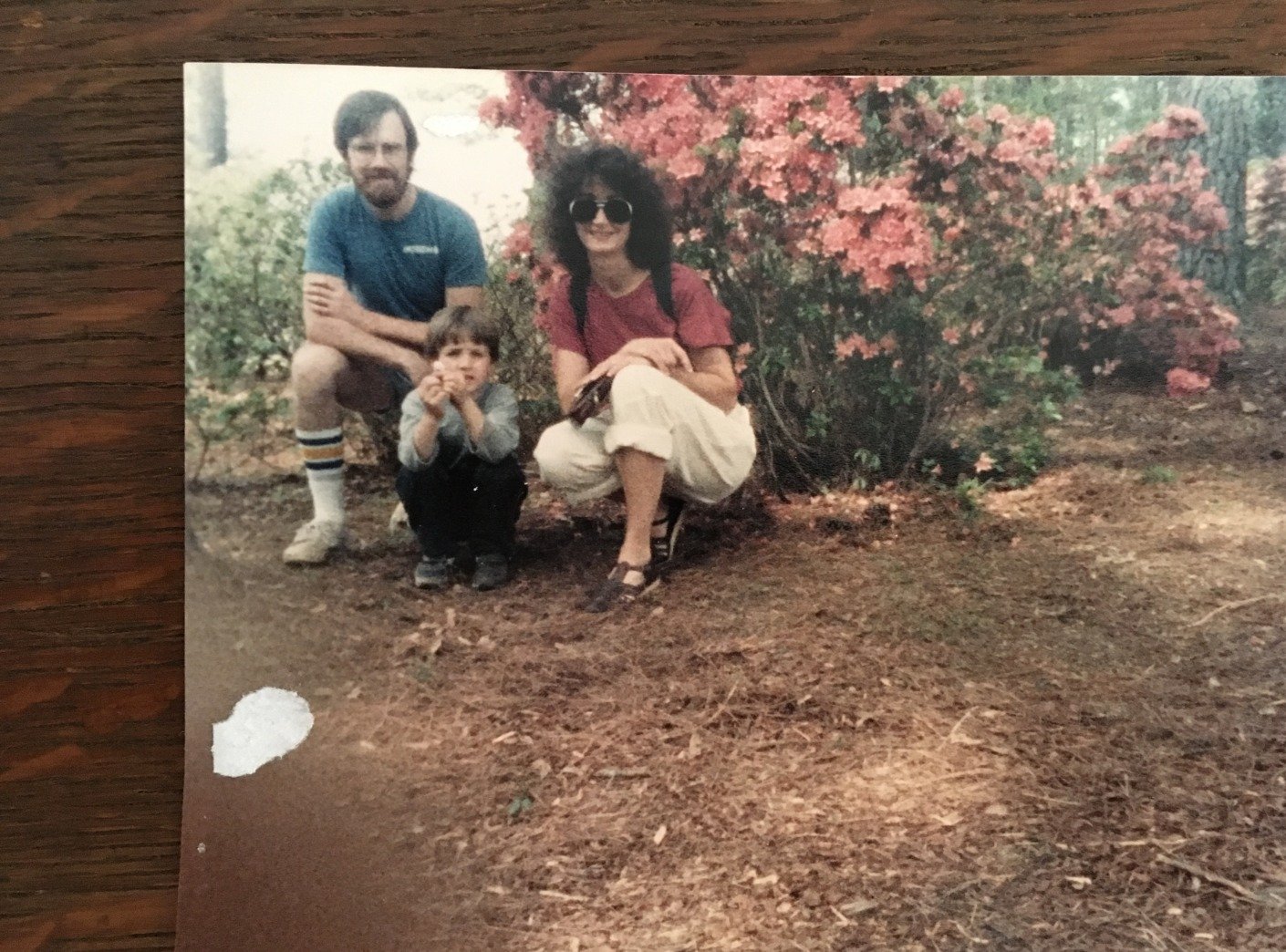 Family in their yard looking at the camera