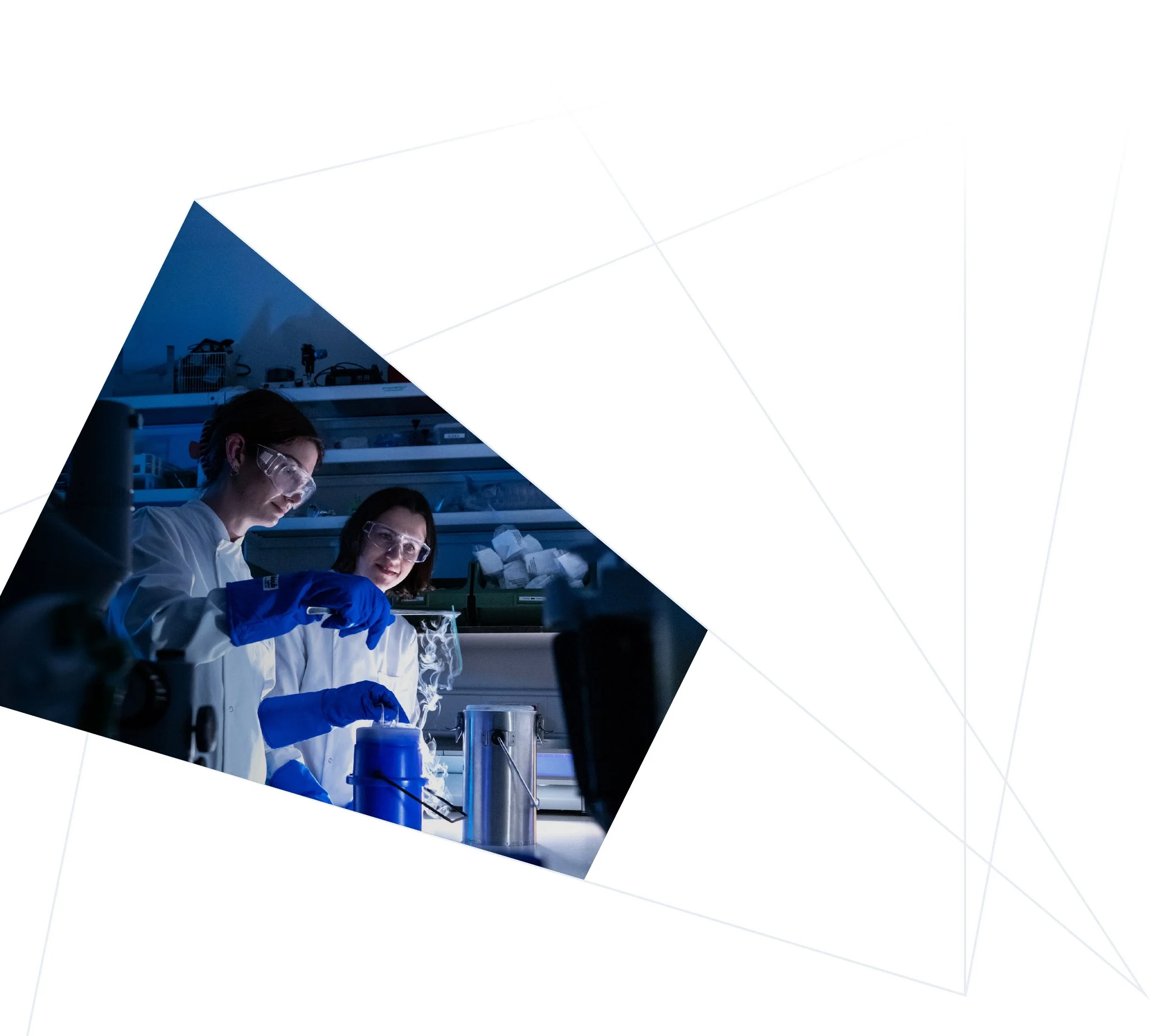Two women in a scientific laboratory conducting experiments with laboratory equipment.