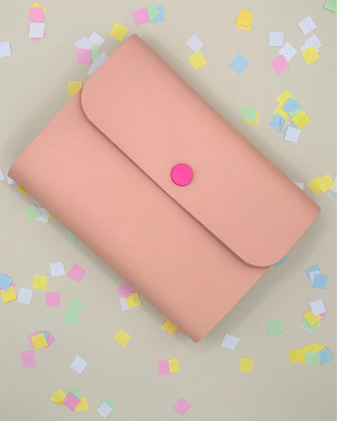 A new, cute-as-a-button journal for those who like their leather a little more relaxed.

Made from a supple Italian vegetable-tanned leather in a range of zingy colours, this version has an easygoing and playful vibe. The fold-over flap keeps your jo