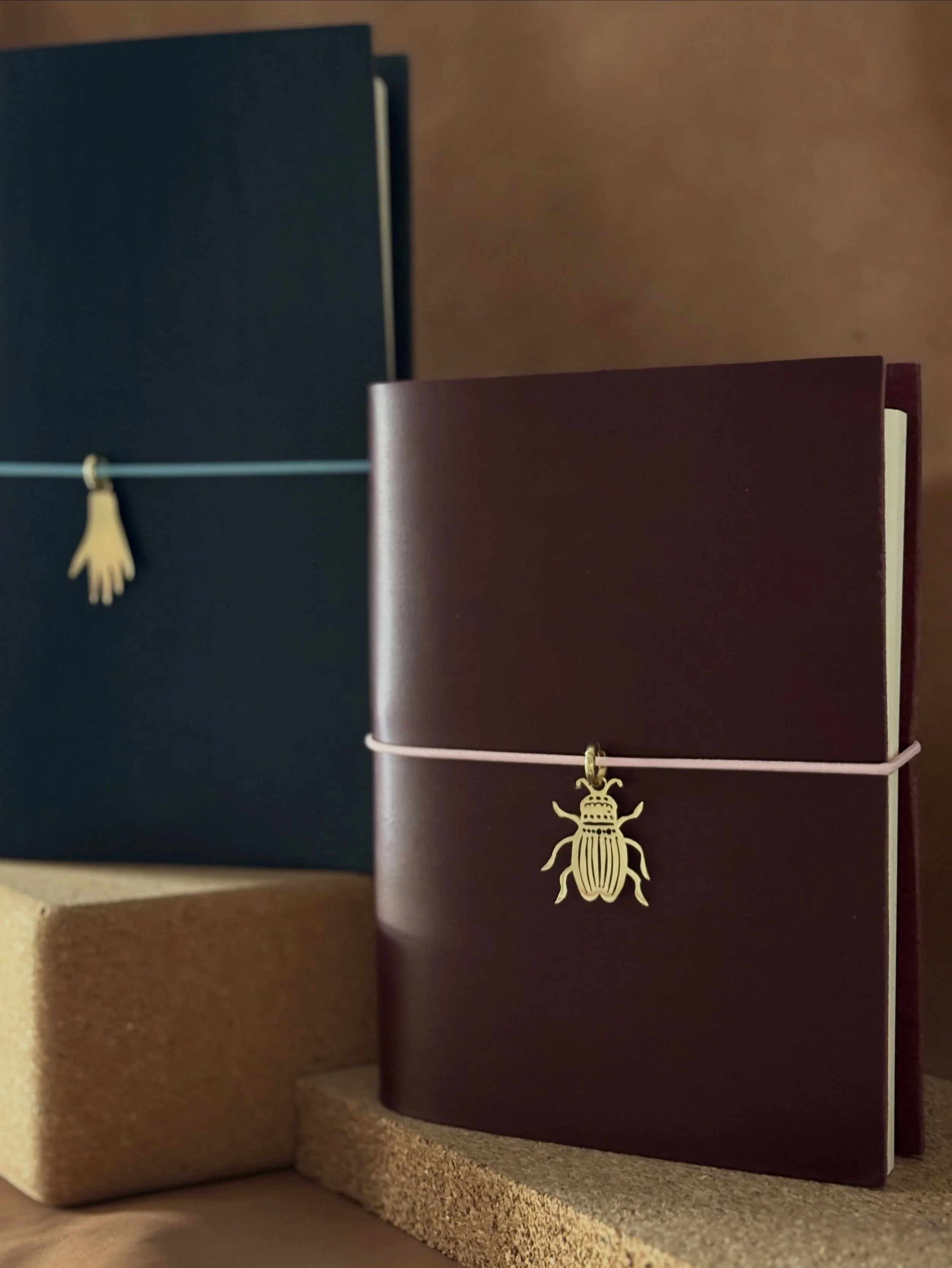 Engraving is not the only way to personalise your journal - take a closer look at our beautiful brass journal charms. Seven unique designs created by the talented @follow_themagpie 

Set on a brass carabiner clip so you can attach it to an already-ma