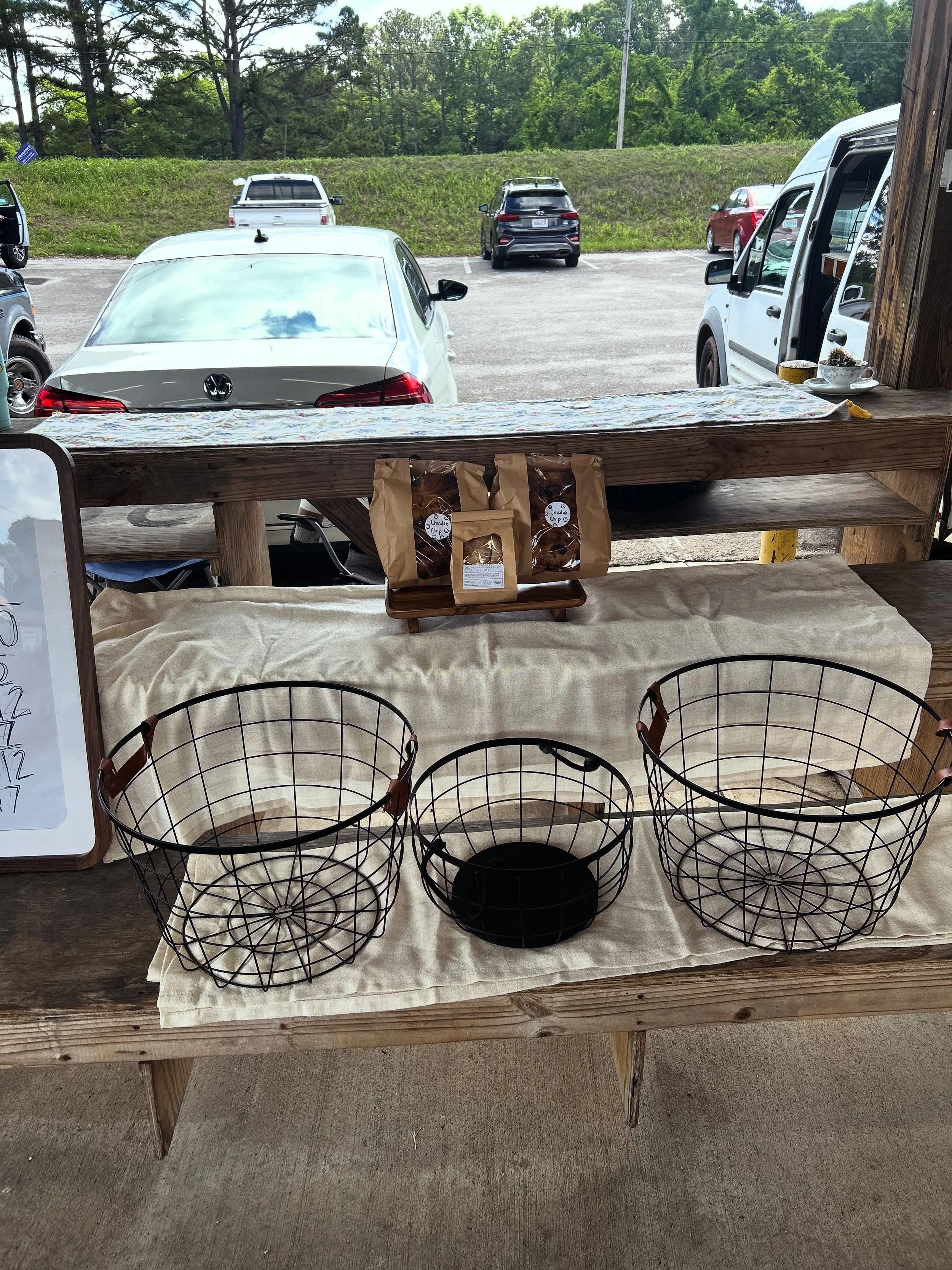 empty baskets at a farmers market stall