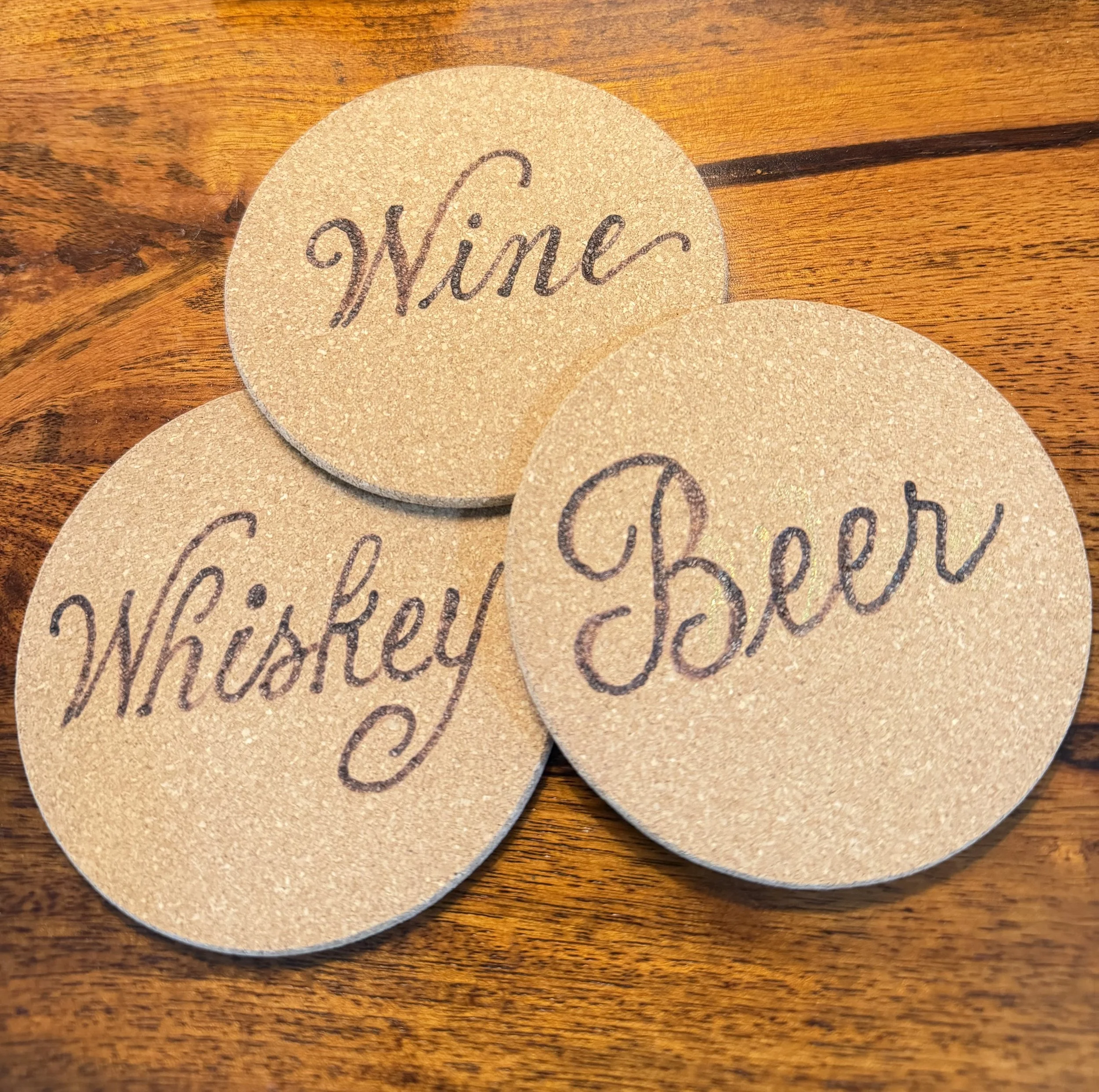 Cork coaster pyrography / Susan Houseman Designs / Las Vegas.