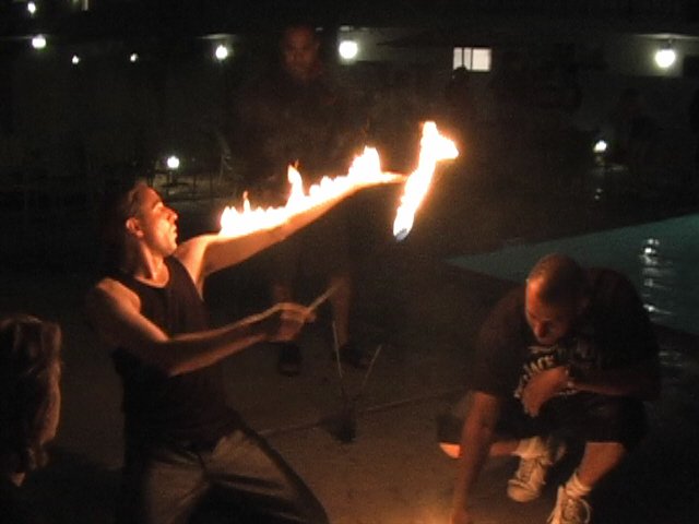 Curtis Finger lighting arm on fire