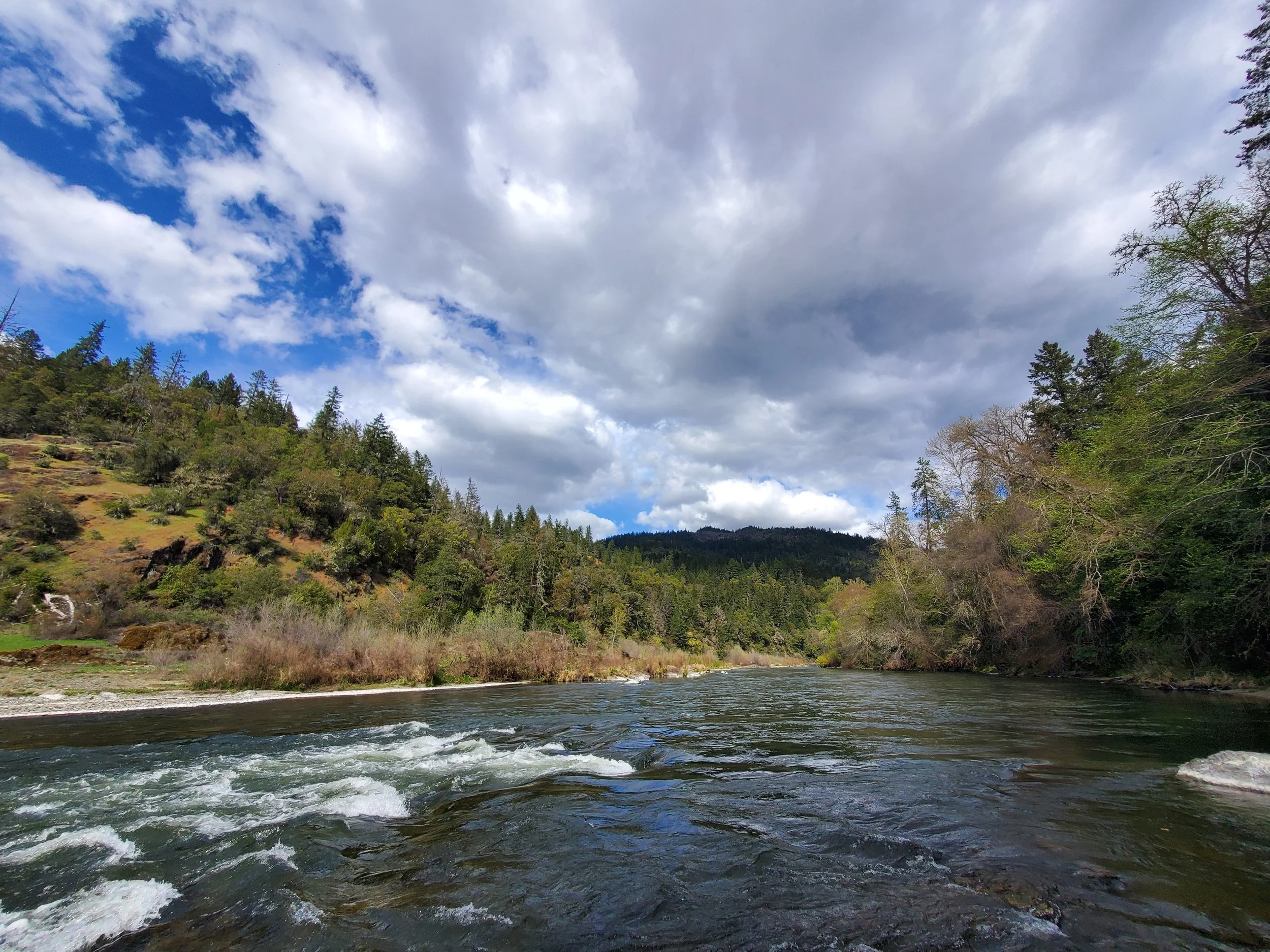 The Rogue River on a partially cloudy day