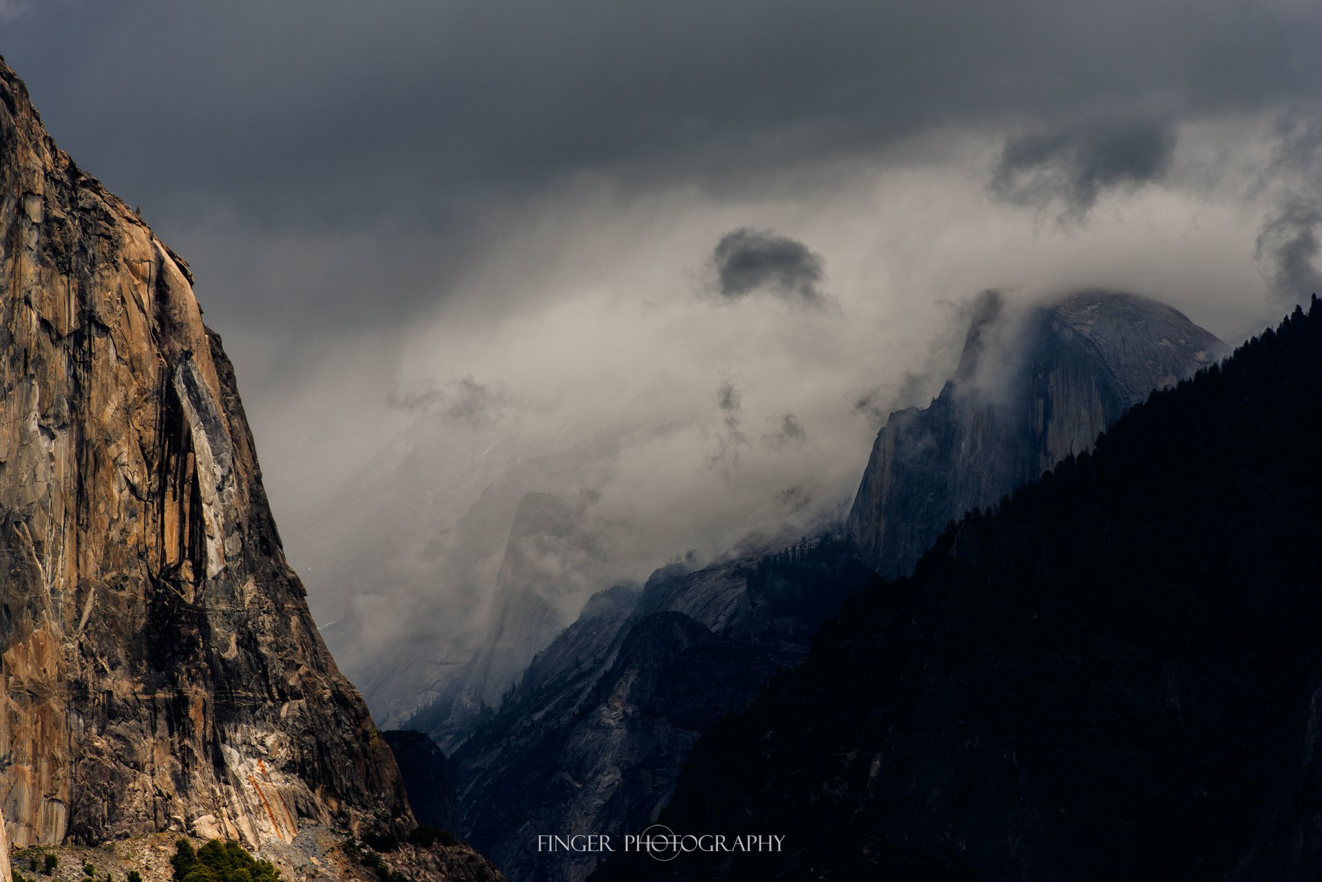Half Dome in the clouds from Inspiration Point