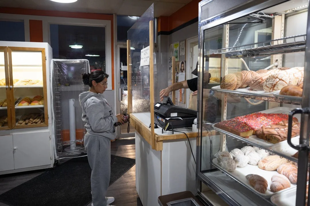 woman ordering pastries at Mexican bakery, shot by commercial photographer Corey Rourke

