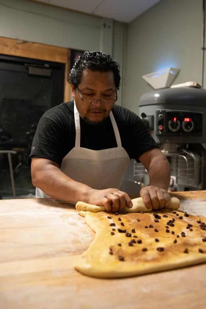 Mexican baker working with dough, shot by commercial photographer Corey Rourke
