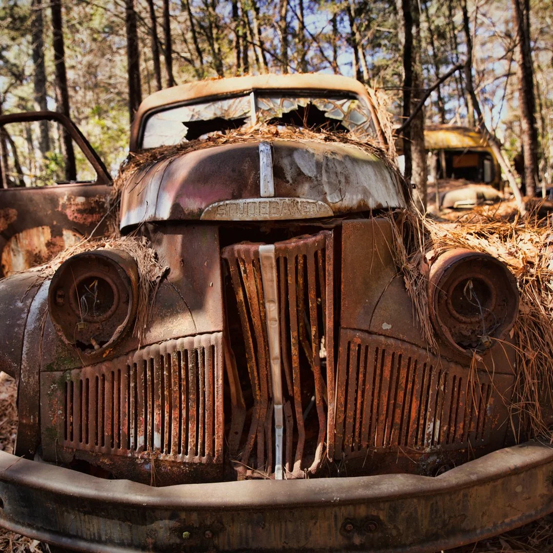 front grill of old rust car
