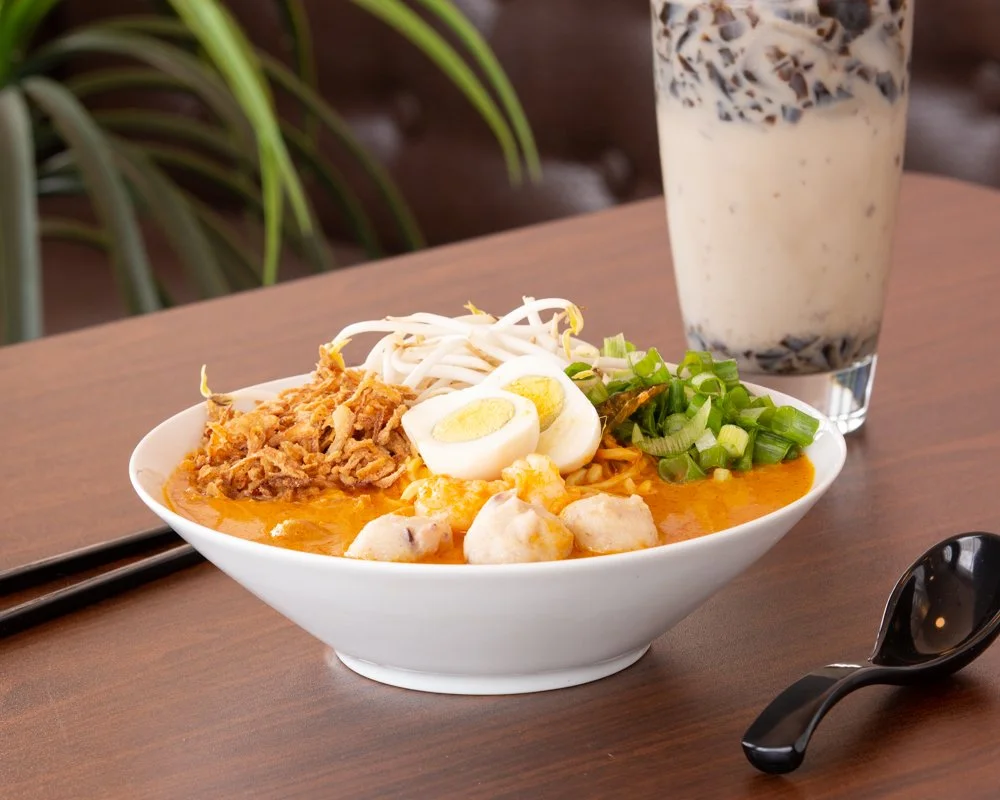 curry bowl with boba tea in background, shot by commercial photographer Corey Rourke

