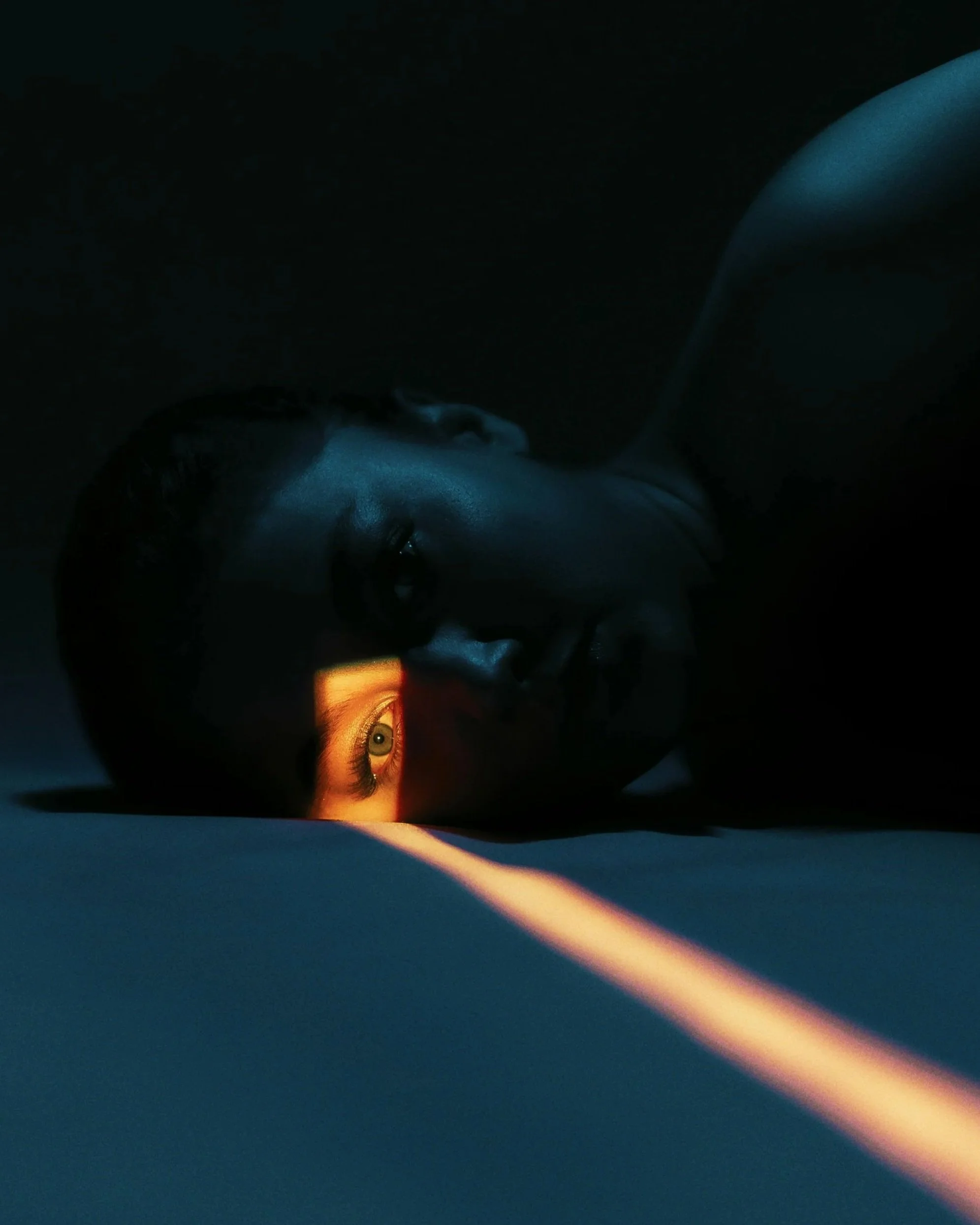 Close-up of a calm, focused eye, symbolizing insight and healing, representing brainspotting therapy services for trauma recovery in Oregon