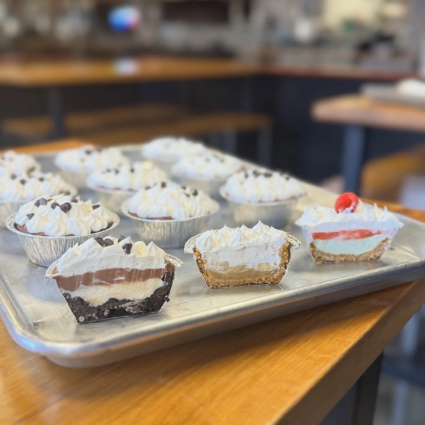 Our Easter menu is here🐰🐰🐰
Hop on over to our website to pre order🐣

Pictured are our Mini Cheesecake Cream Pies🥧

Here&rsquo;s the rest of the scoop>>>

🪺Cheesecake Cream Pie 6 Pack - 2 Raspberry Key Lime, 2 Banoffee &amp; 2 Chocolate