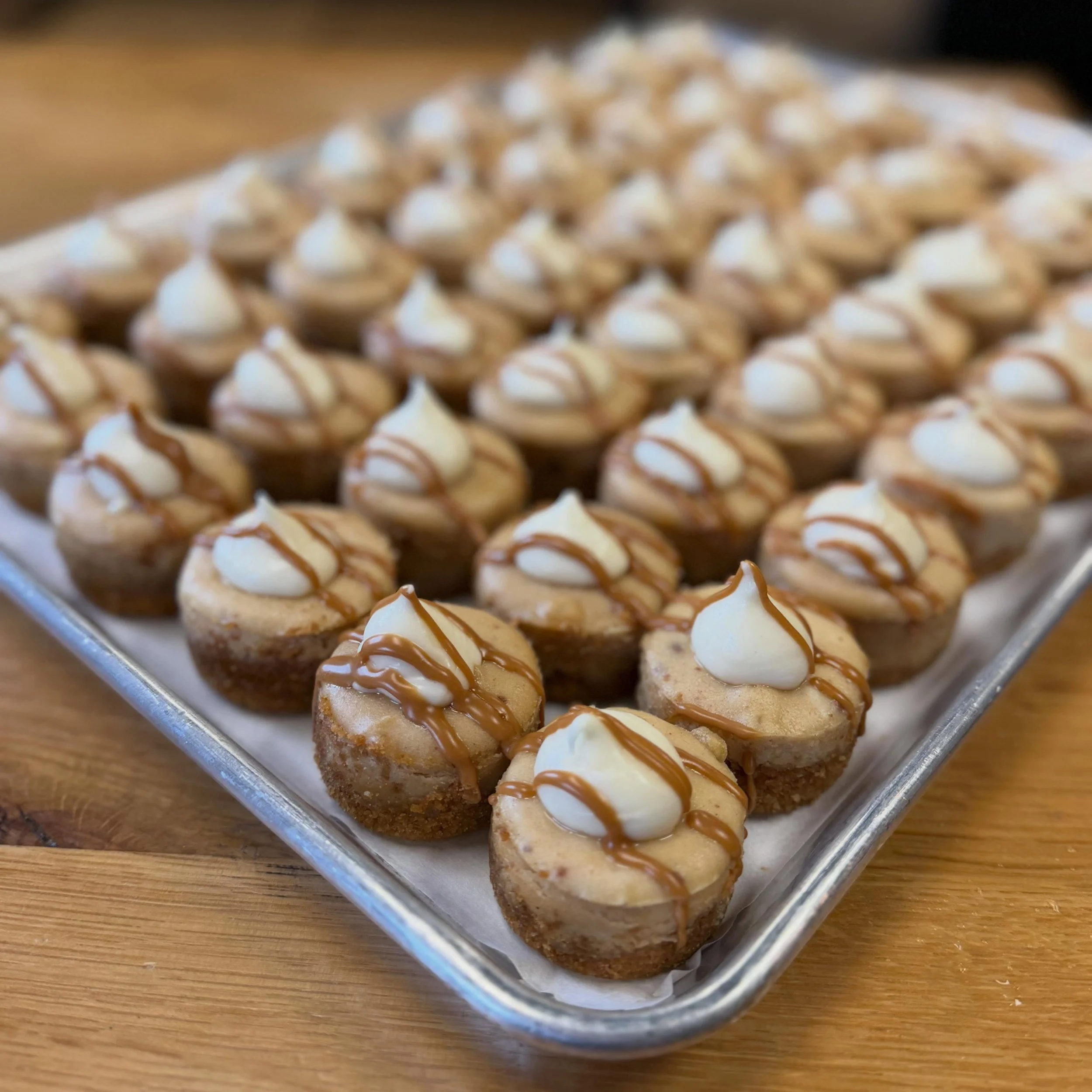 Cookie Butter Cinnamon Roll Mini Cheesecakes🌟
Graham crust, cookie butter cheesecake mixed with cinny roll filling, topped with cream cheese icing &amp; cookie butter drizzle🙏🏻🙏🏻🙏🏻 headed to all locations today! 

In honor of our catering coor