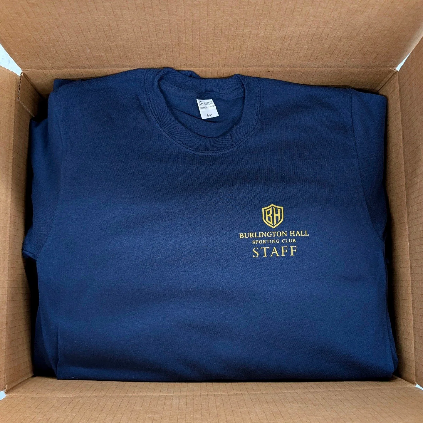 Fresh off the press 📦🔥
Clean, crisp, and ready to rep.

Burlington Hall staff tees looking sharp in that navy &amp; gold 💙✨
Another clean run by @customprintlab &mdash; Made in Hamilton.

Need tees for your team, brand, or event?
DM us to get star