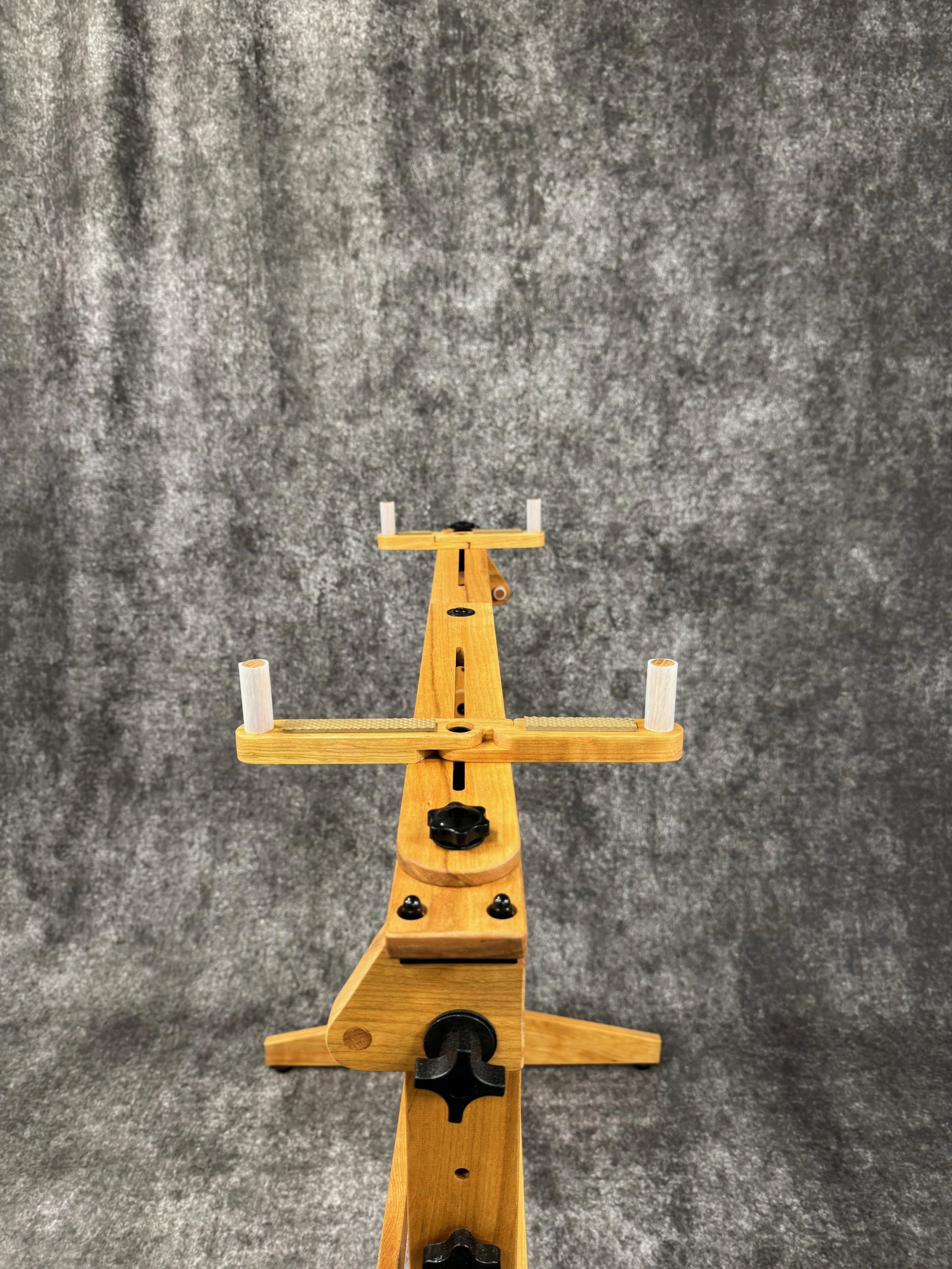 A mountain dulcimer stand with adjustable braces.