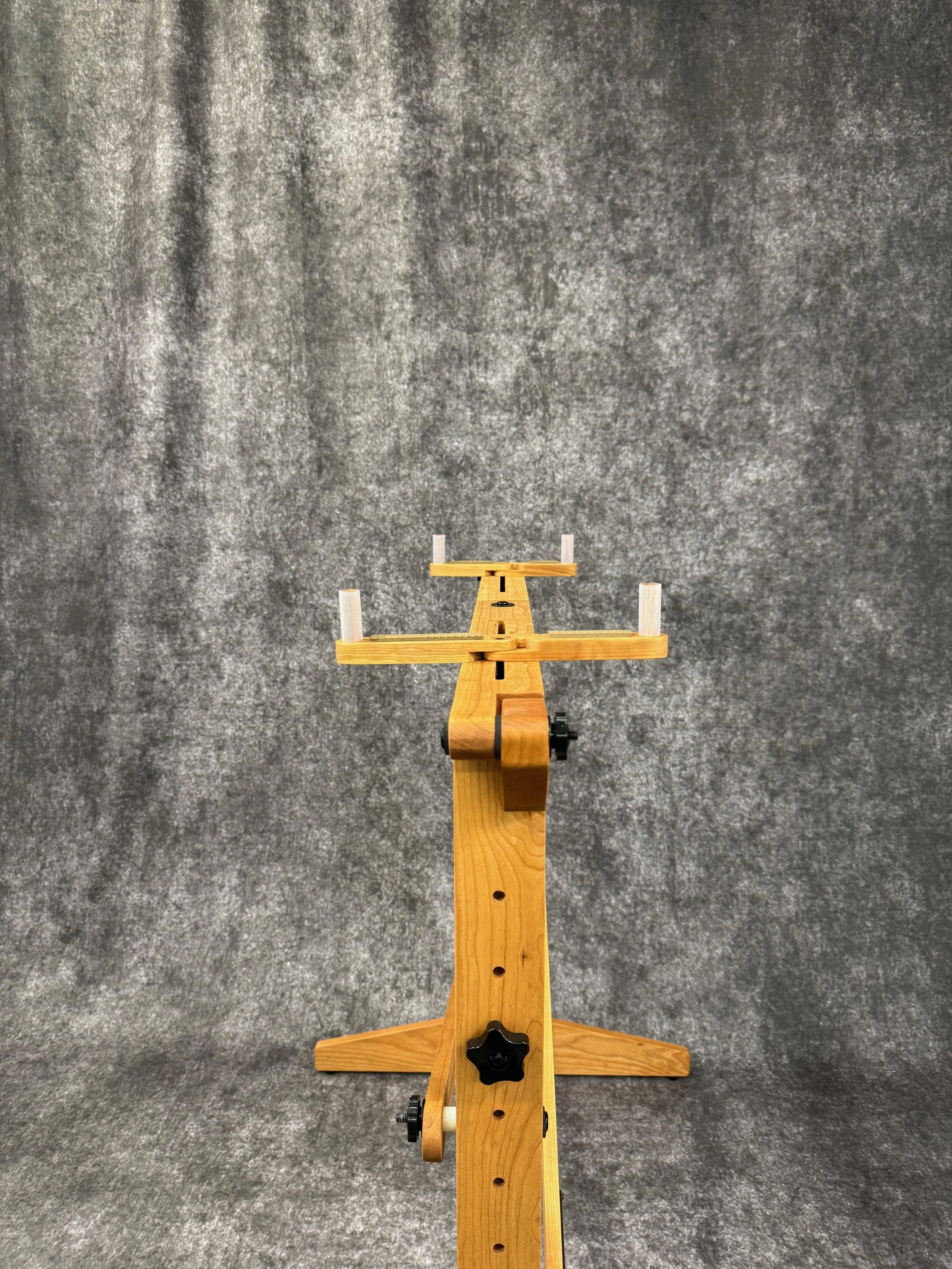 A mountain dulcimer stand with adjustable braces.