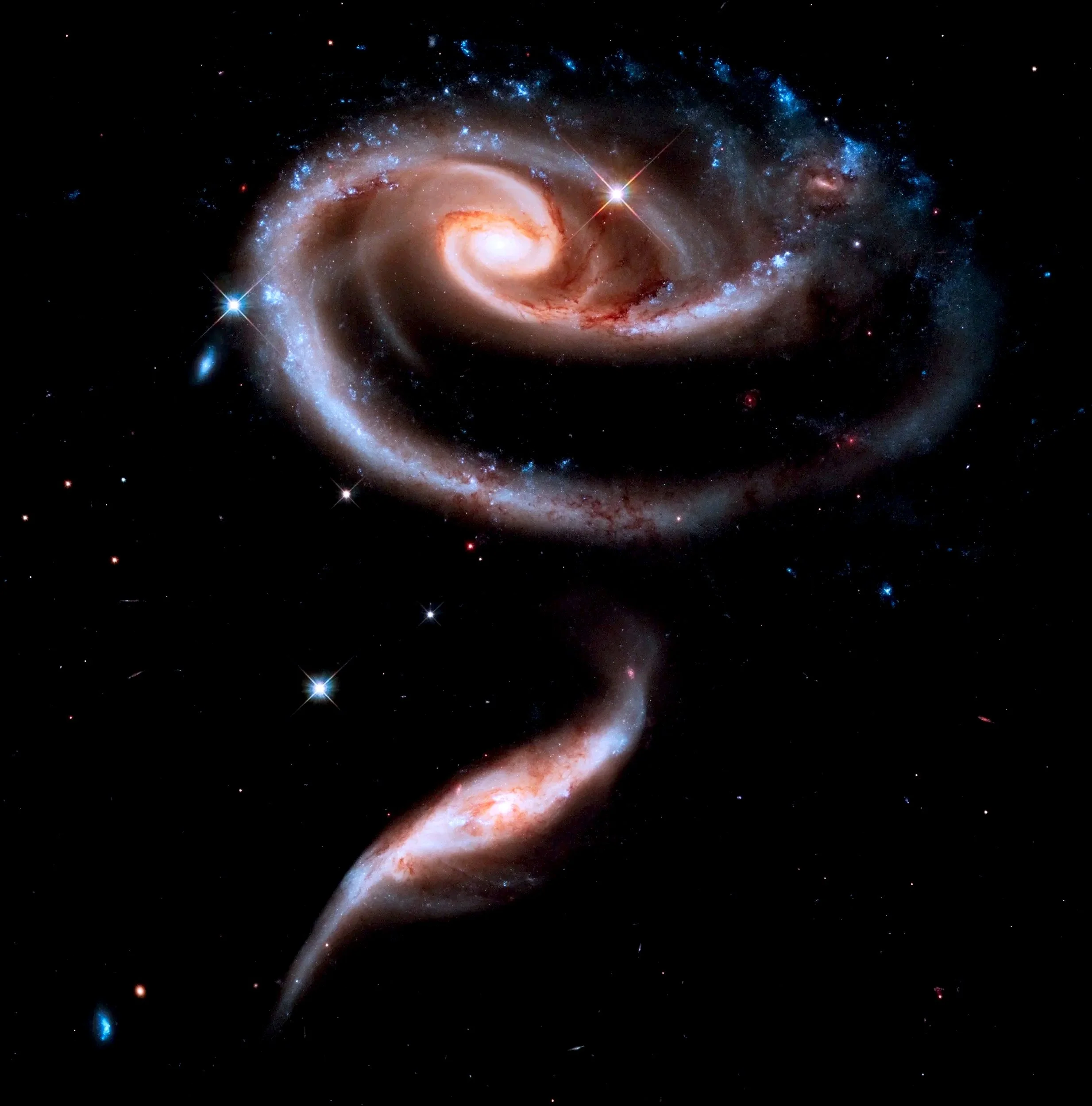 Spiral galaxy representing Your Saturn Return, a profound astrology session for navigating the transformative Saturn Return cycle