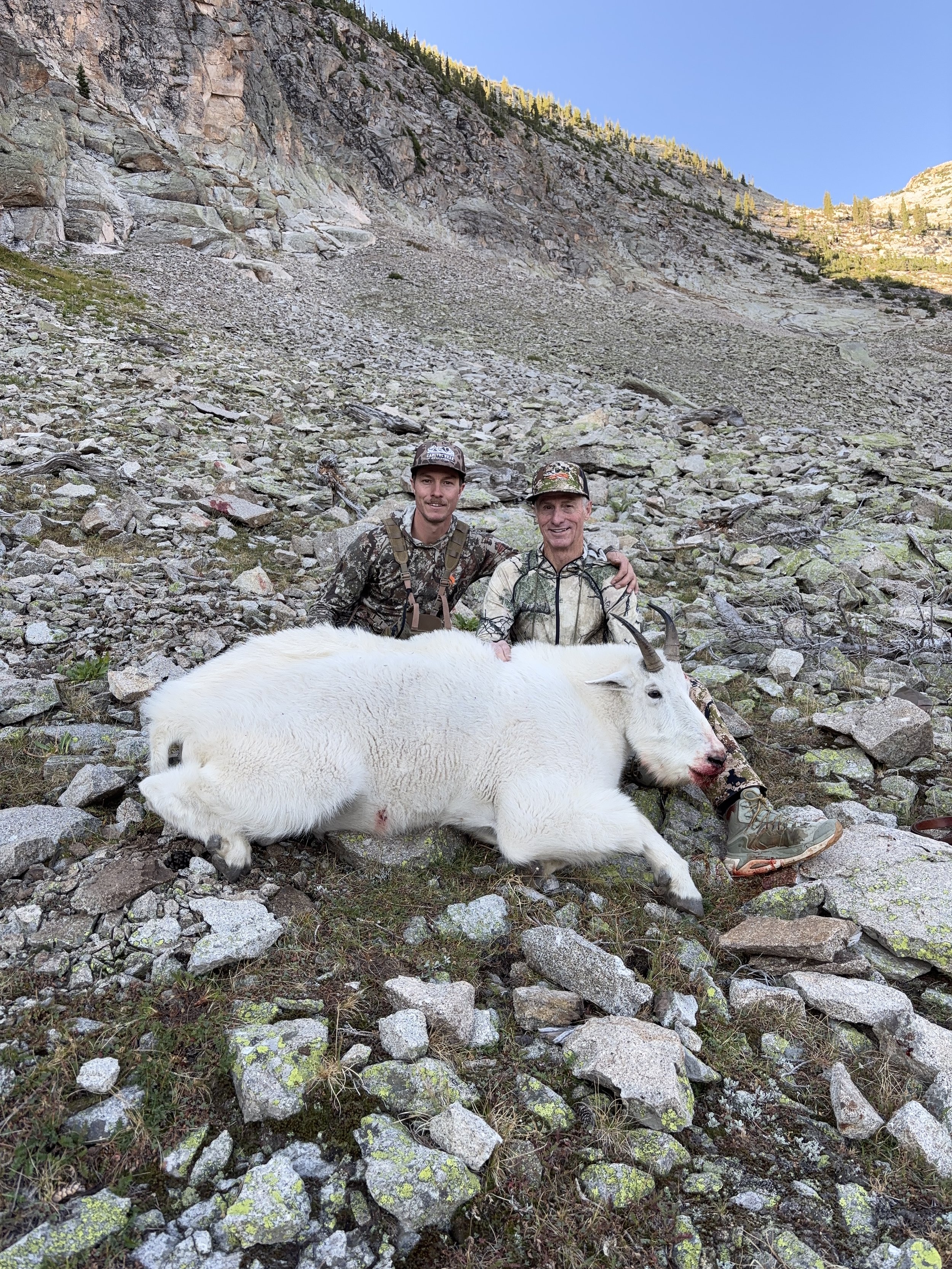 Ted Benge and hunter with a mature billy mountain goat killed in Colorado unit G11