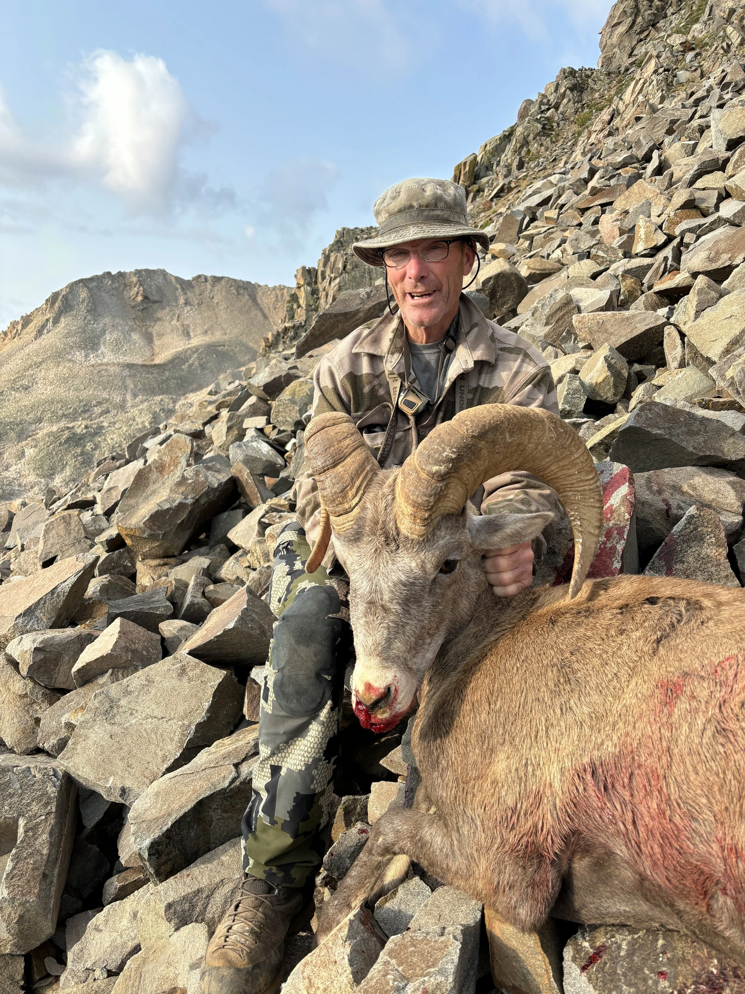 Hunter with bighorn ram taken in Colorado GMU S13