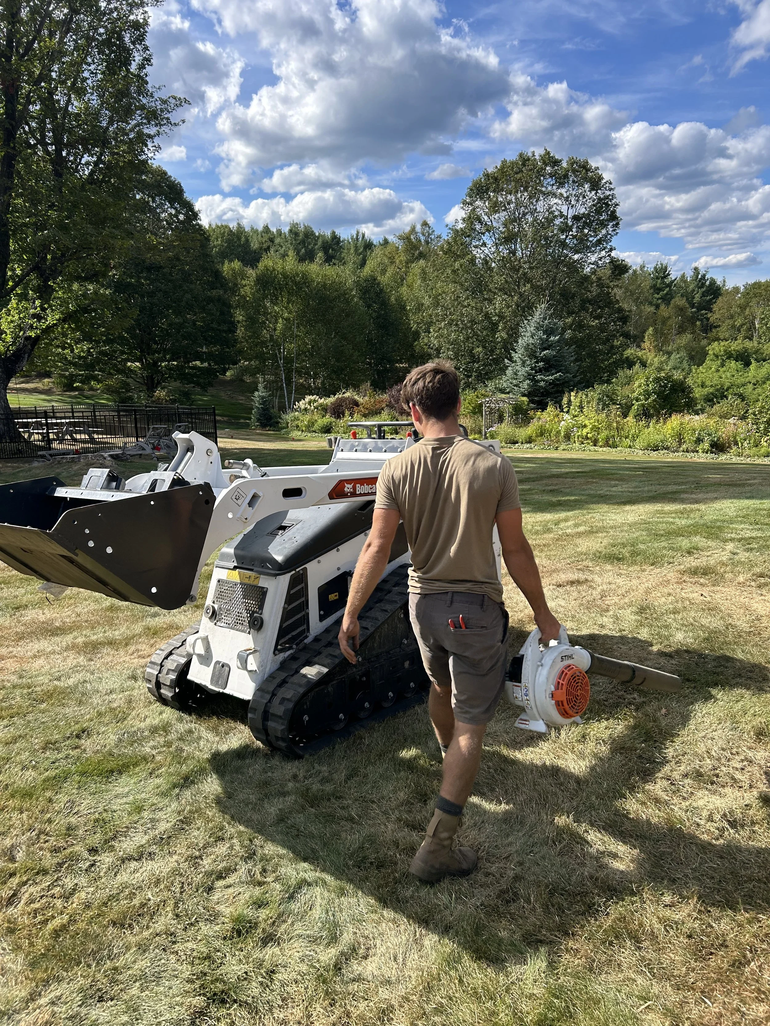 Devan cleaning Mini Bob 2025.jpg