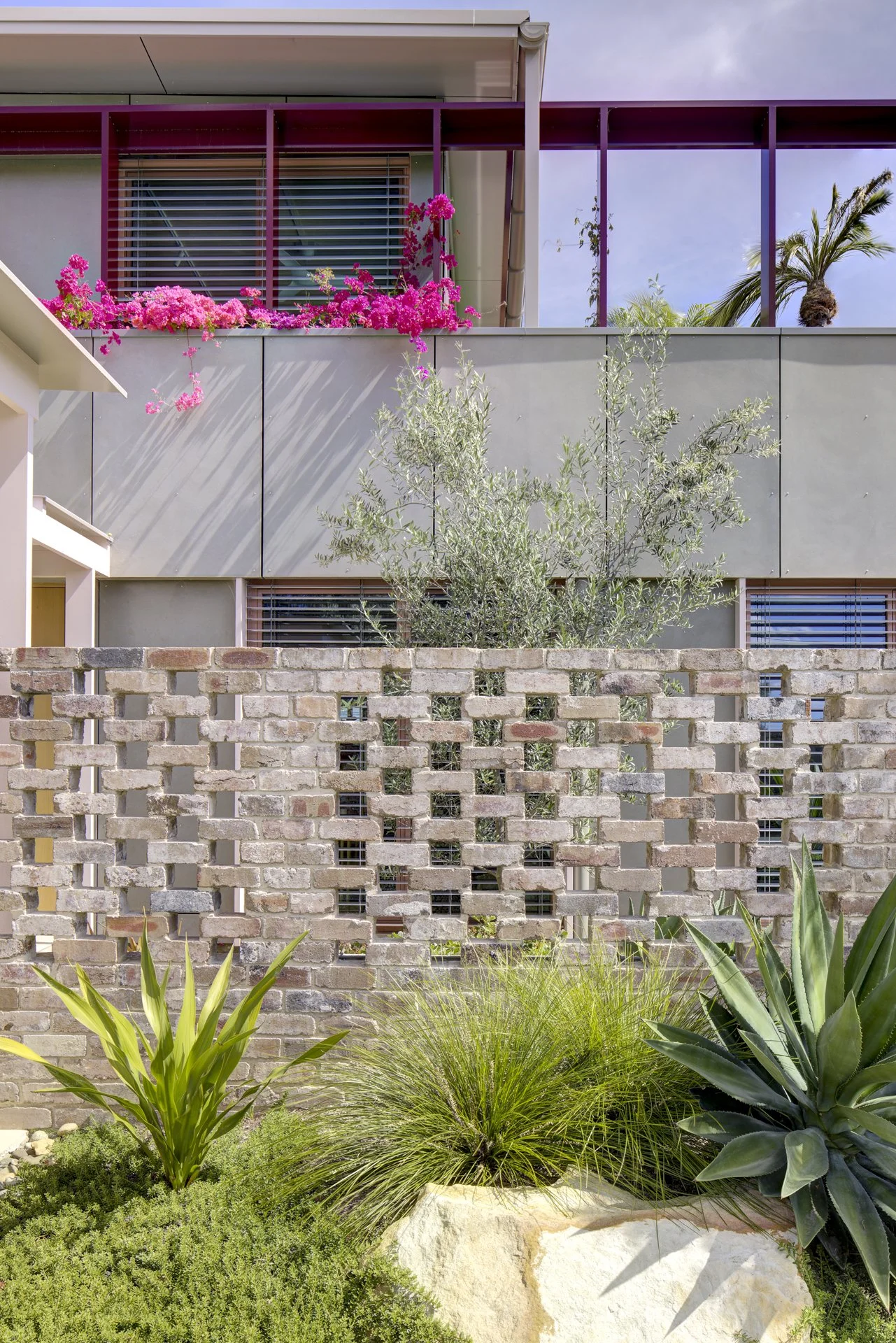The building facade reduces summer heat gains
