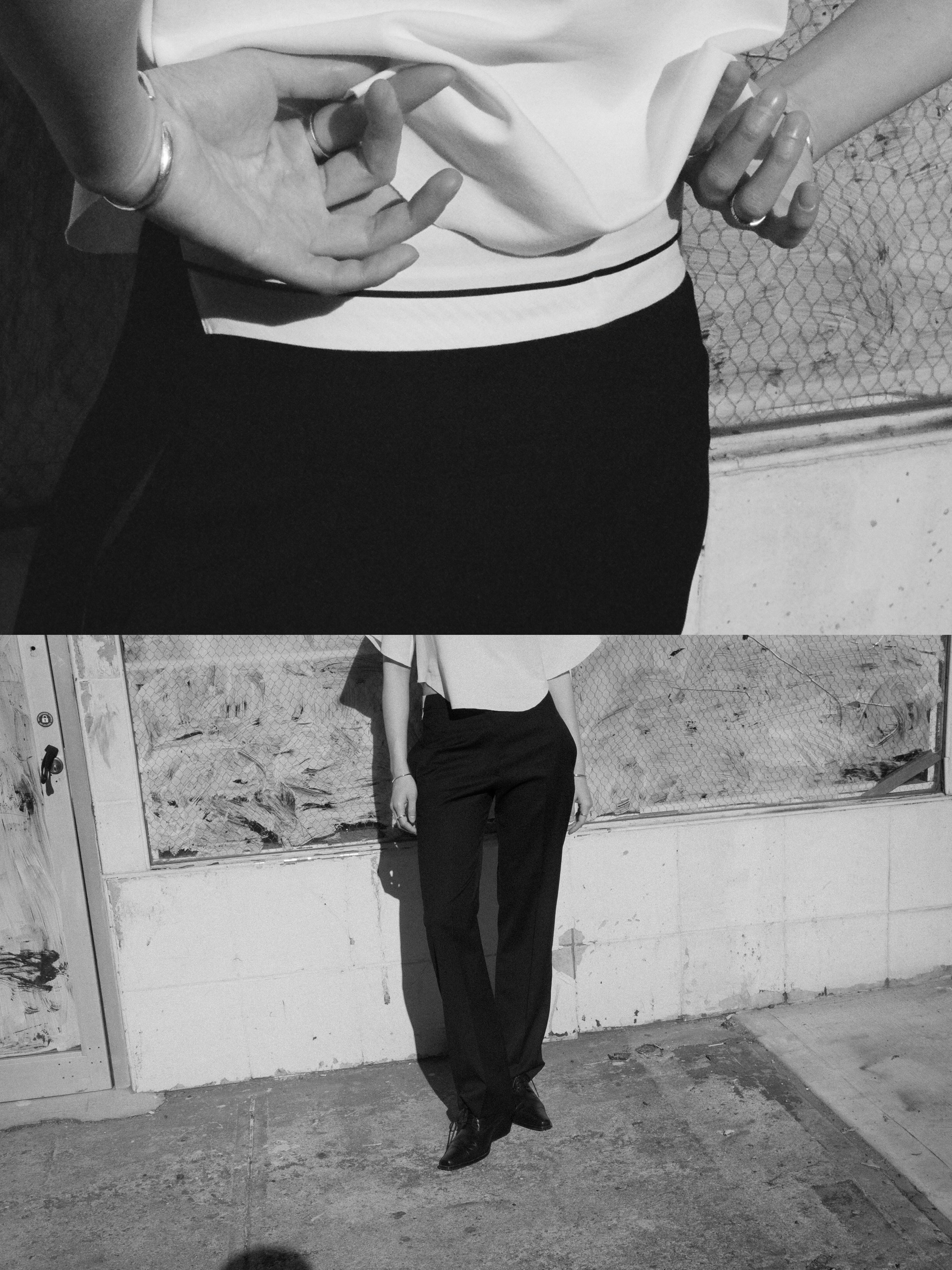 TROUSERS WITH EXPOSED CURTAIN