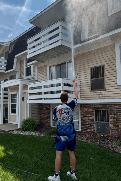 Lansing Precision Power-Wash power washing an apartment building in Lansing, Mi
