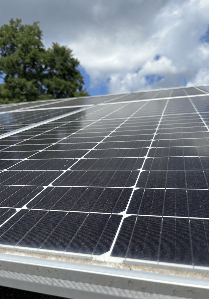 Before photo of a solar panel with a nice layer of dust and bird droppings on it