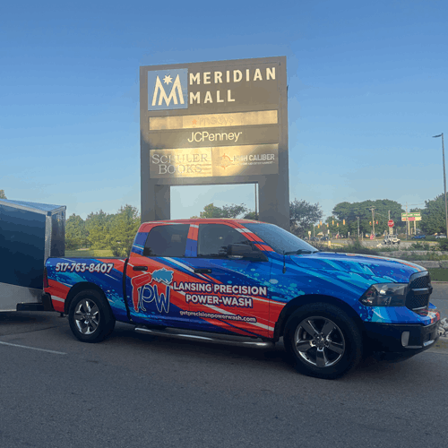 Lansing Precision Power-Wash's wrapped truck in front of the Meridian Mall sign in Okemos, Mi.