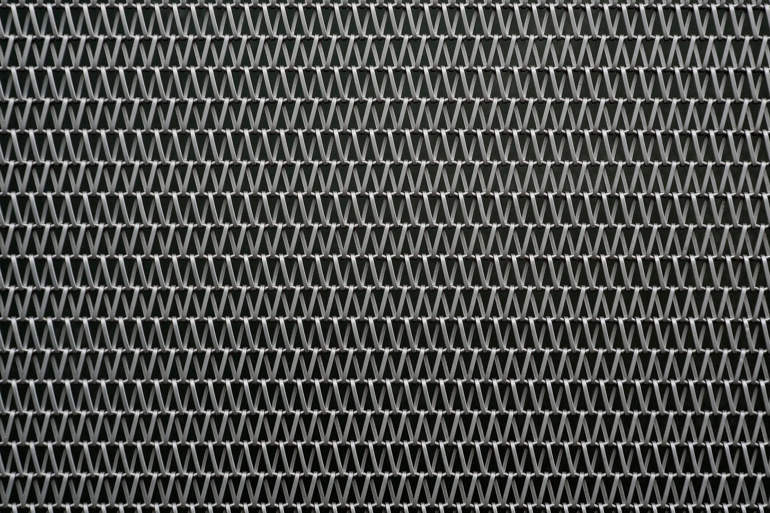 Expanded metal lath against black background