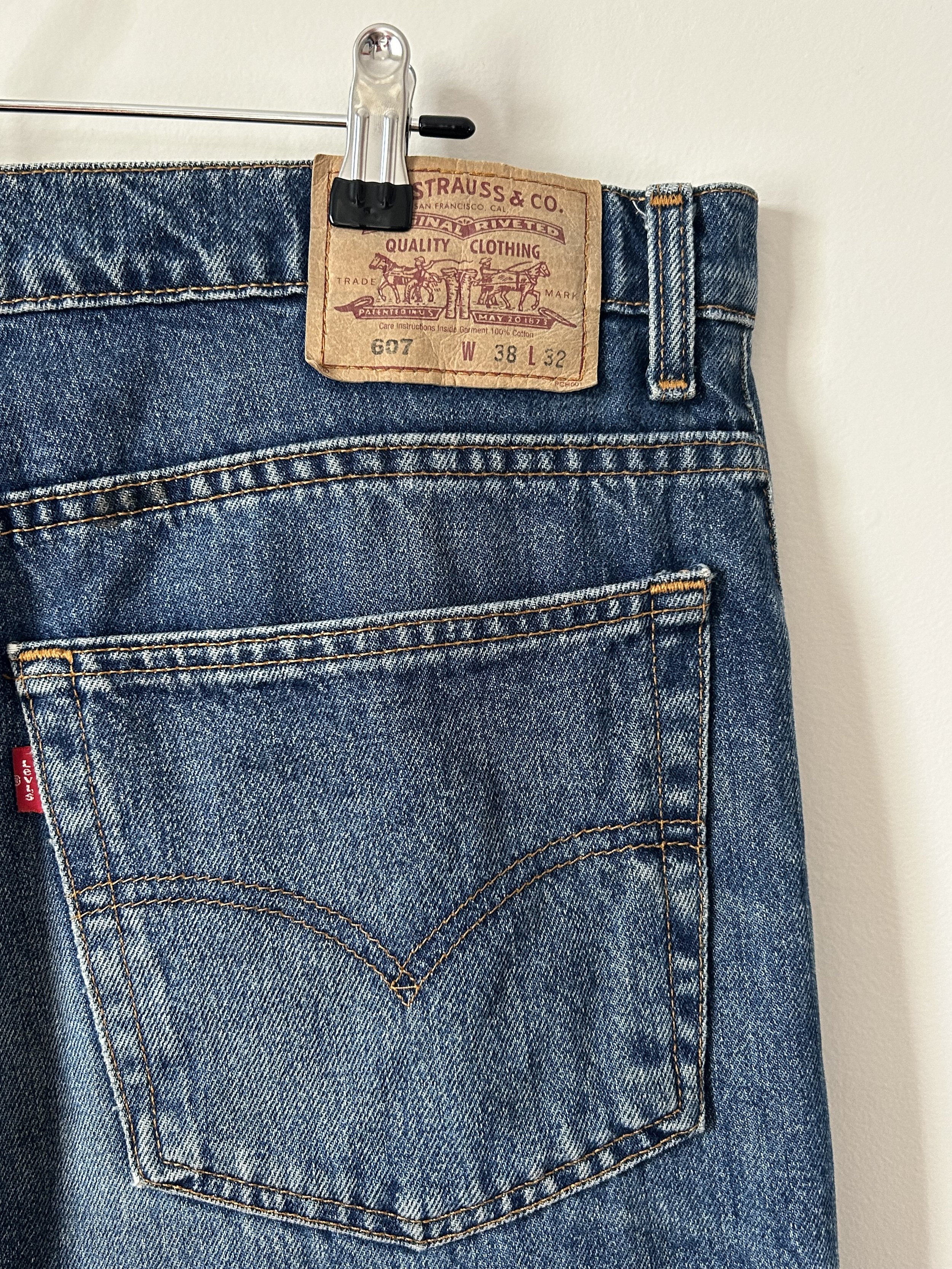 the back pocket and label of of pair of vintage blue Levi's 607 jeans