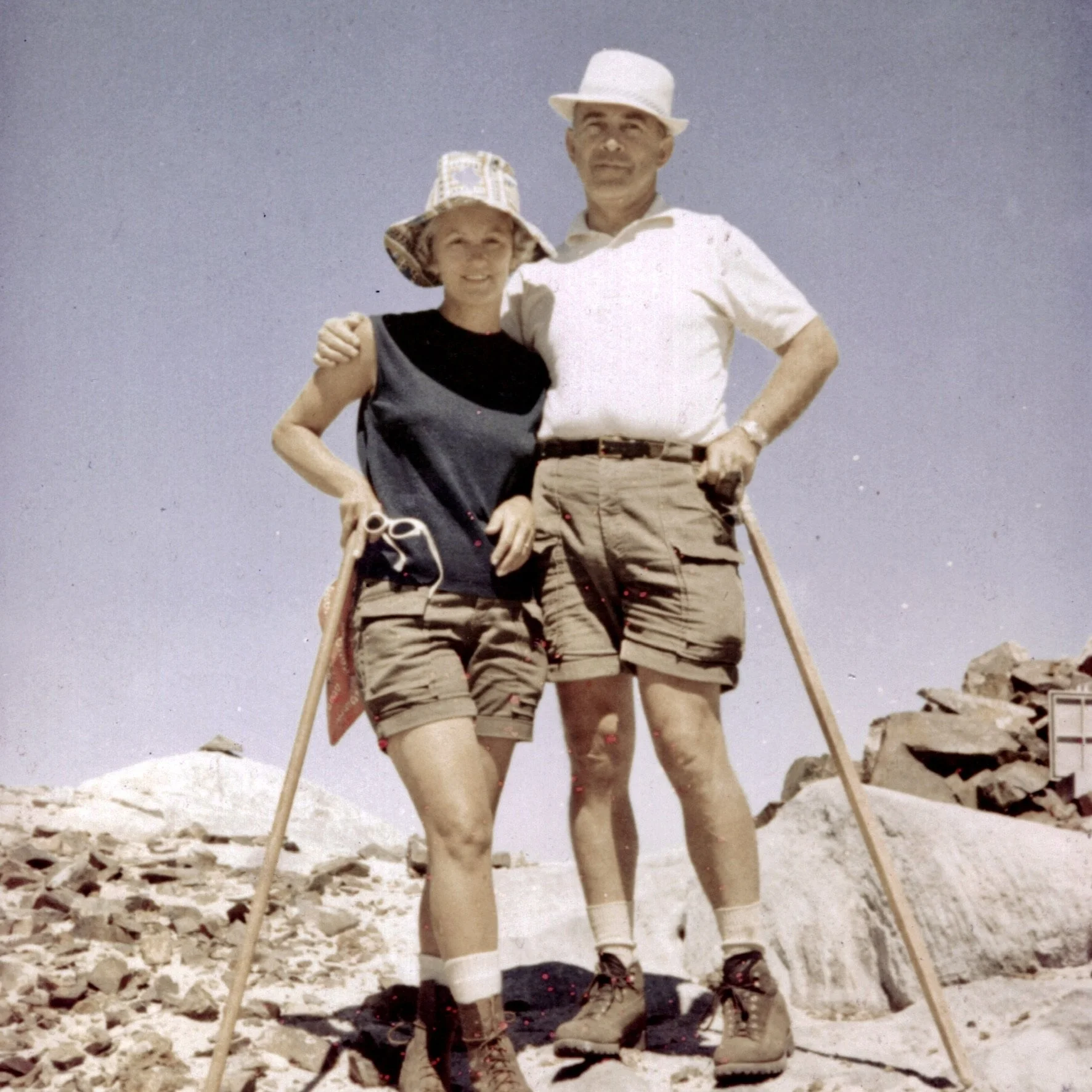 Vintage photo of a couple hiking in the mountains, reflecting a lifelong love of exploration and outdoor adventure.