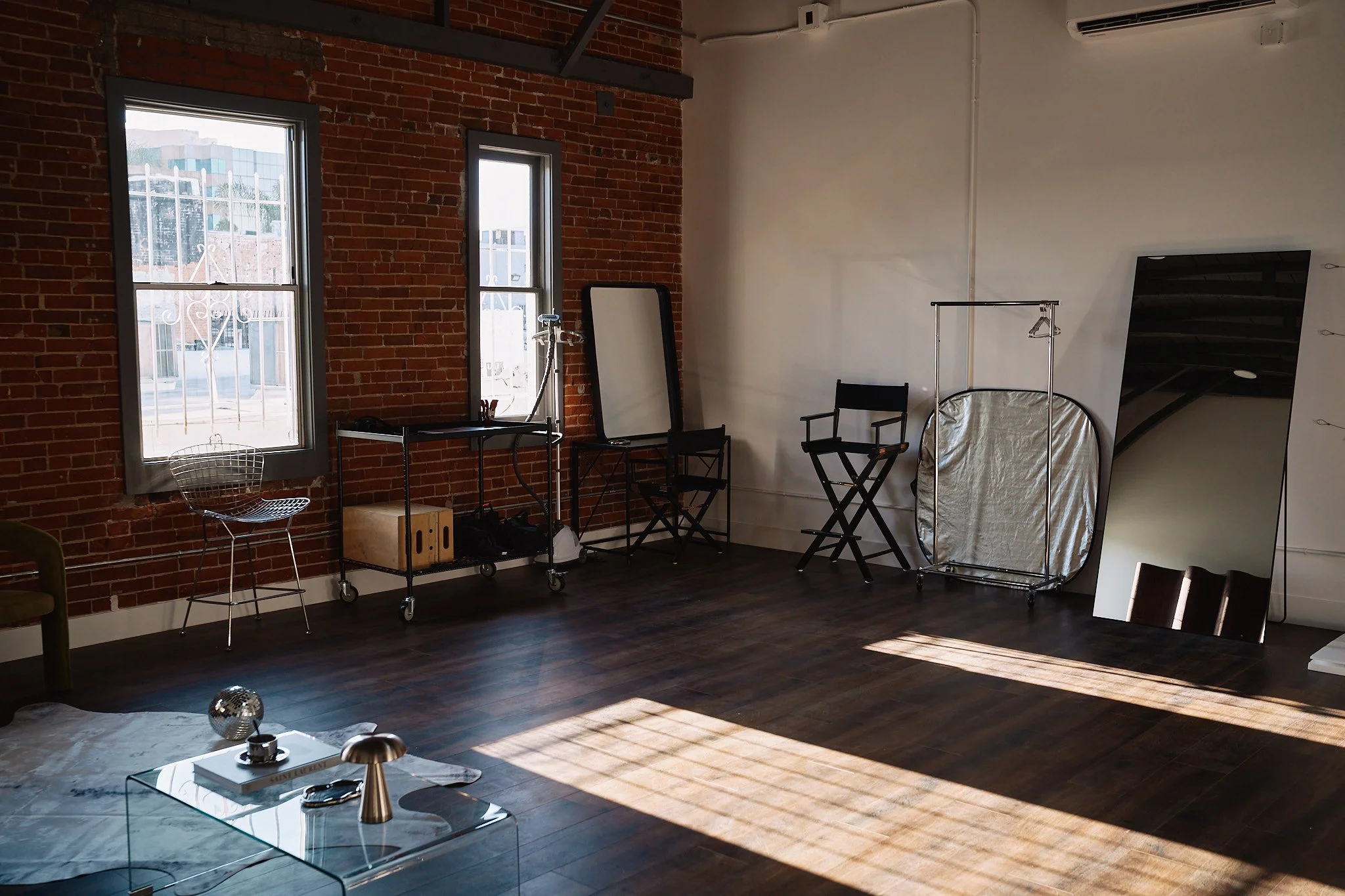 the-space-oc-studio-3-studio-floor-brick-windows-daylight-rental-orange-county.jpg