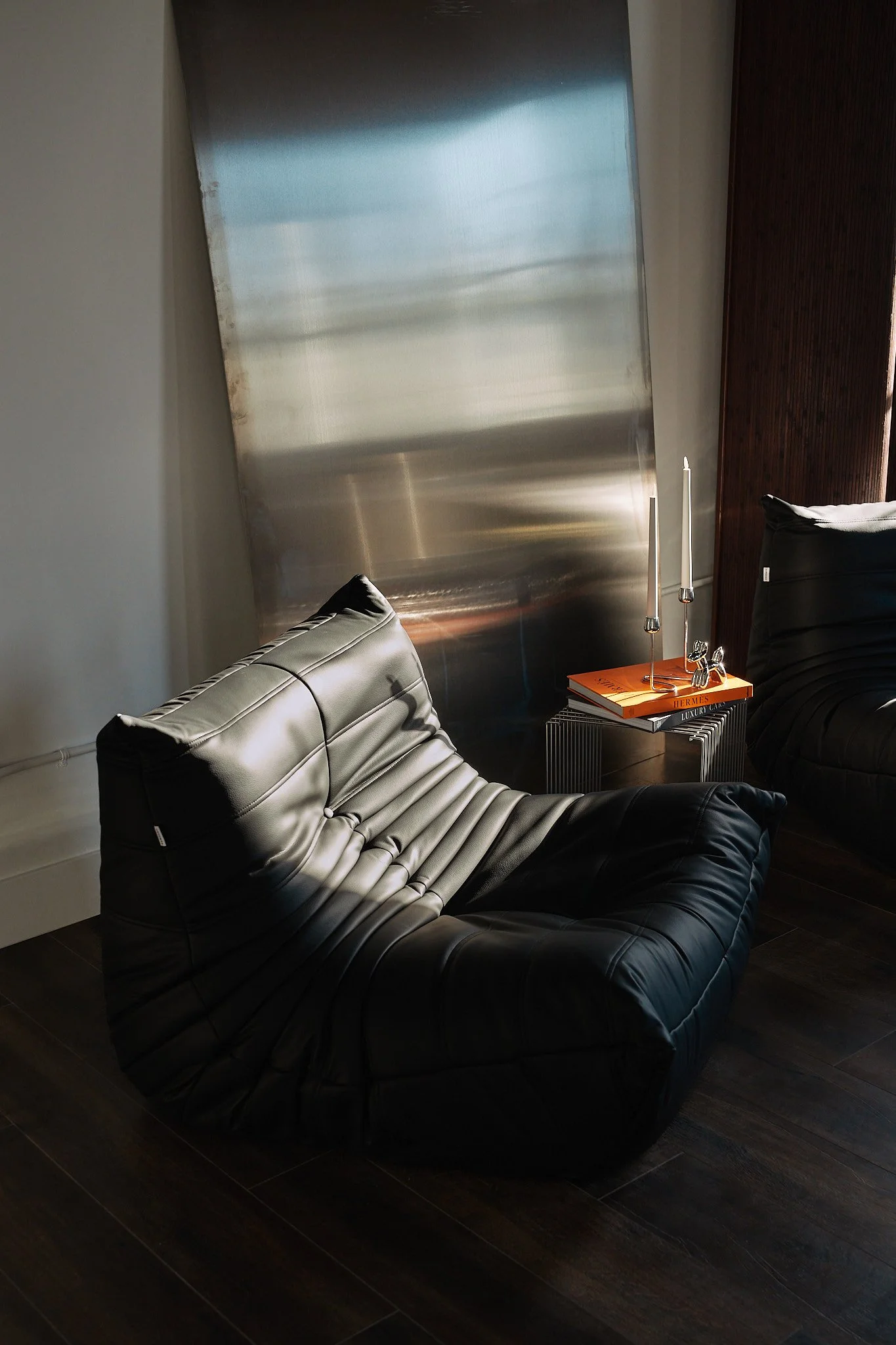 the-space-oc-studio-3-leather-lounge-chair-metal-backdrop-studio-orange-county.jpg