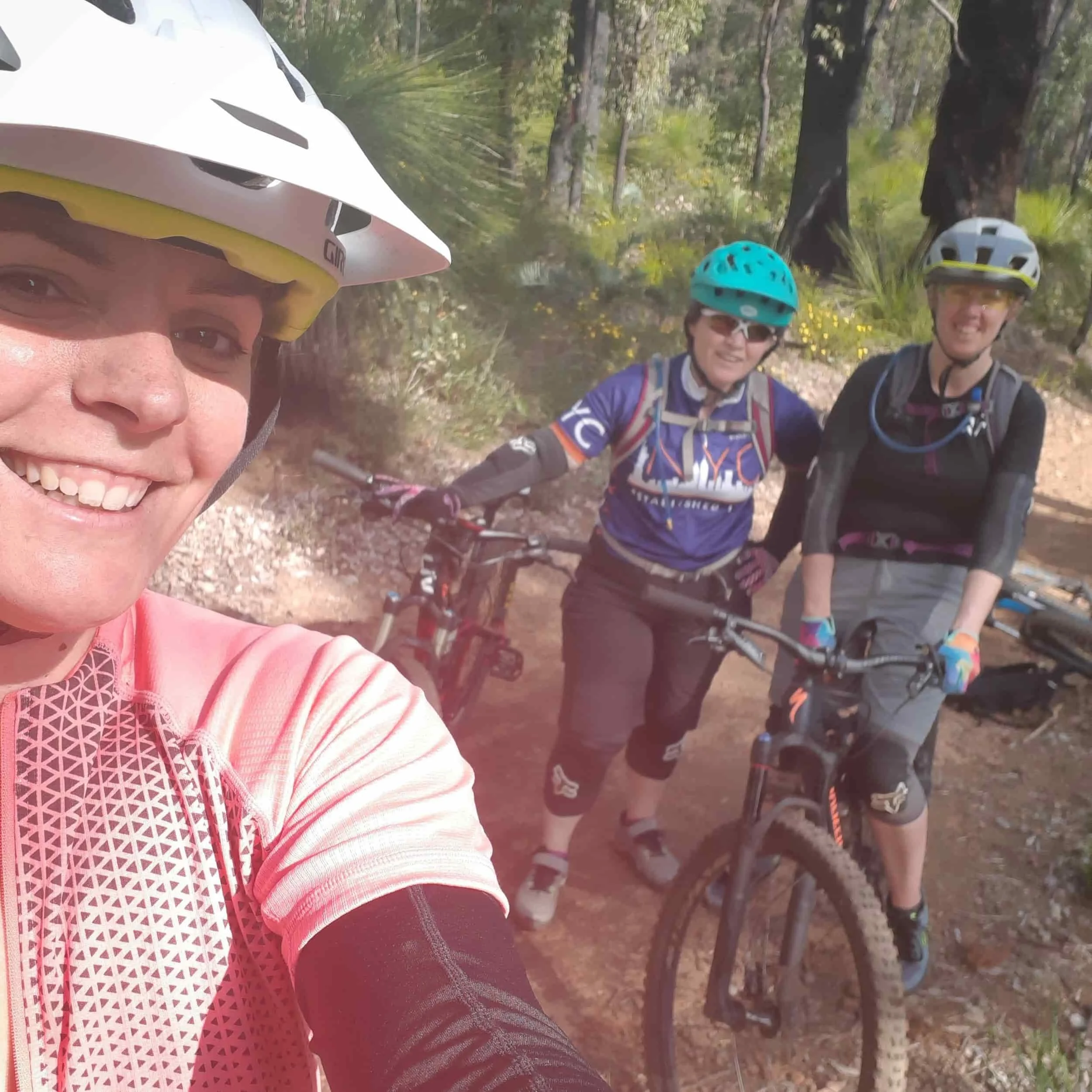 Adventure Physio, Stephanie Lock and friends capture a fun selfie on a bike trail at Lake Leschenaultia