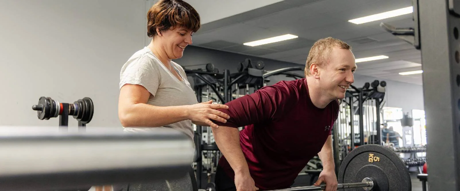 Adventure physio physiotherapist Stephanie Lock and client working in the gym to enhance exercise form for injury prevention, injury management, post surgical rehab and strength and conditioning