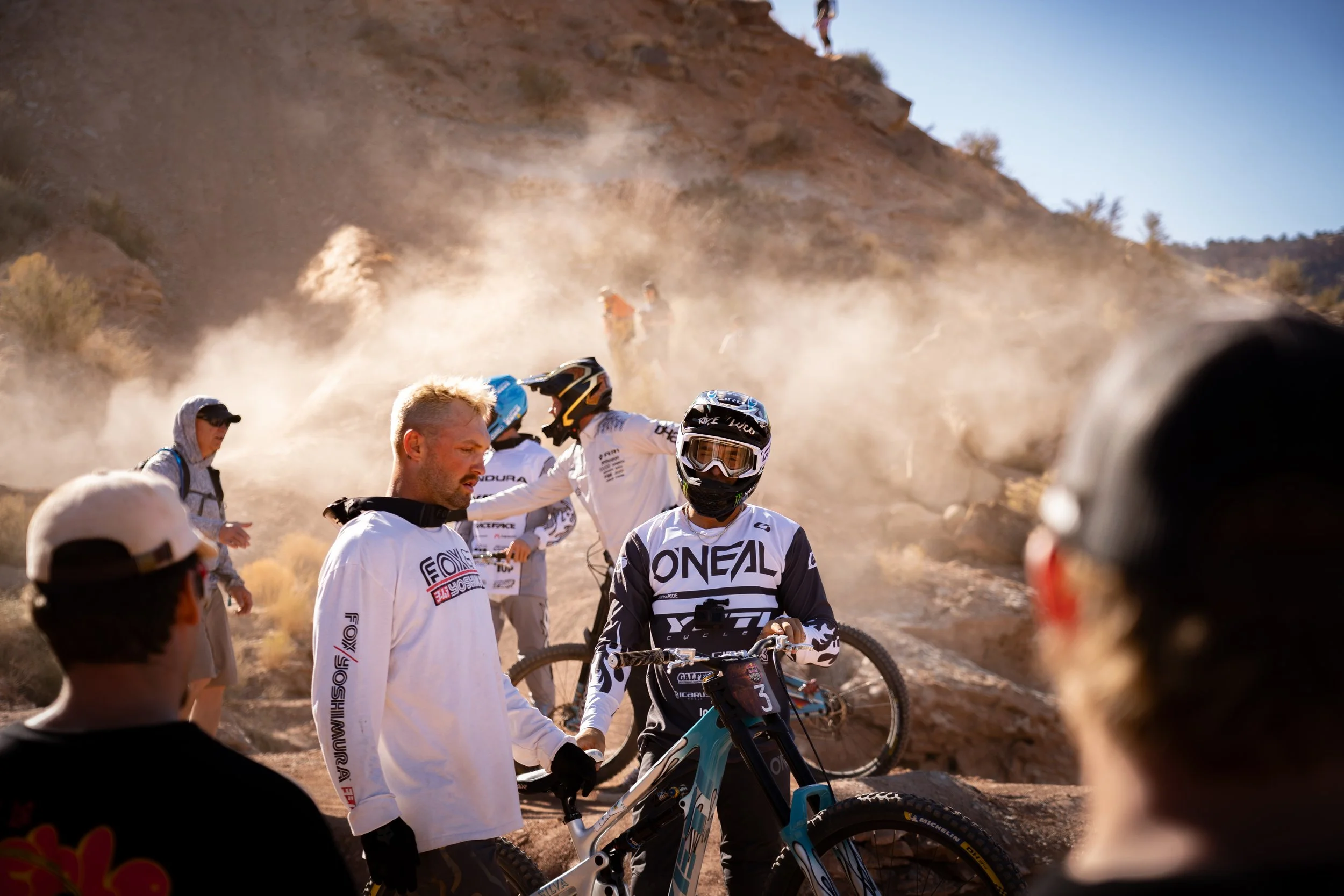 Group of mountain bikers in desert landscape