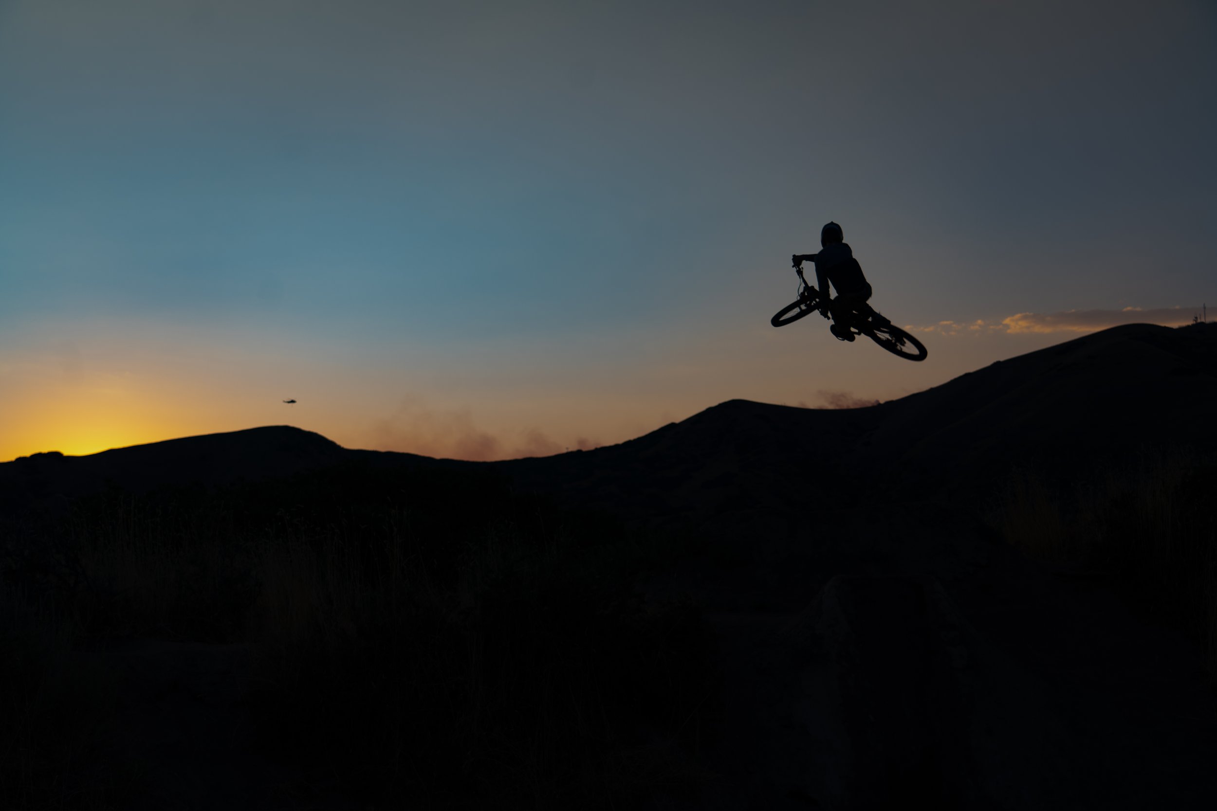 Sunset Mountain Bike Shots With A Plane In the Background | Photography by Anders Henrikson Photo 