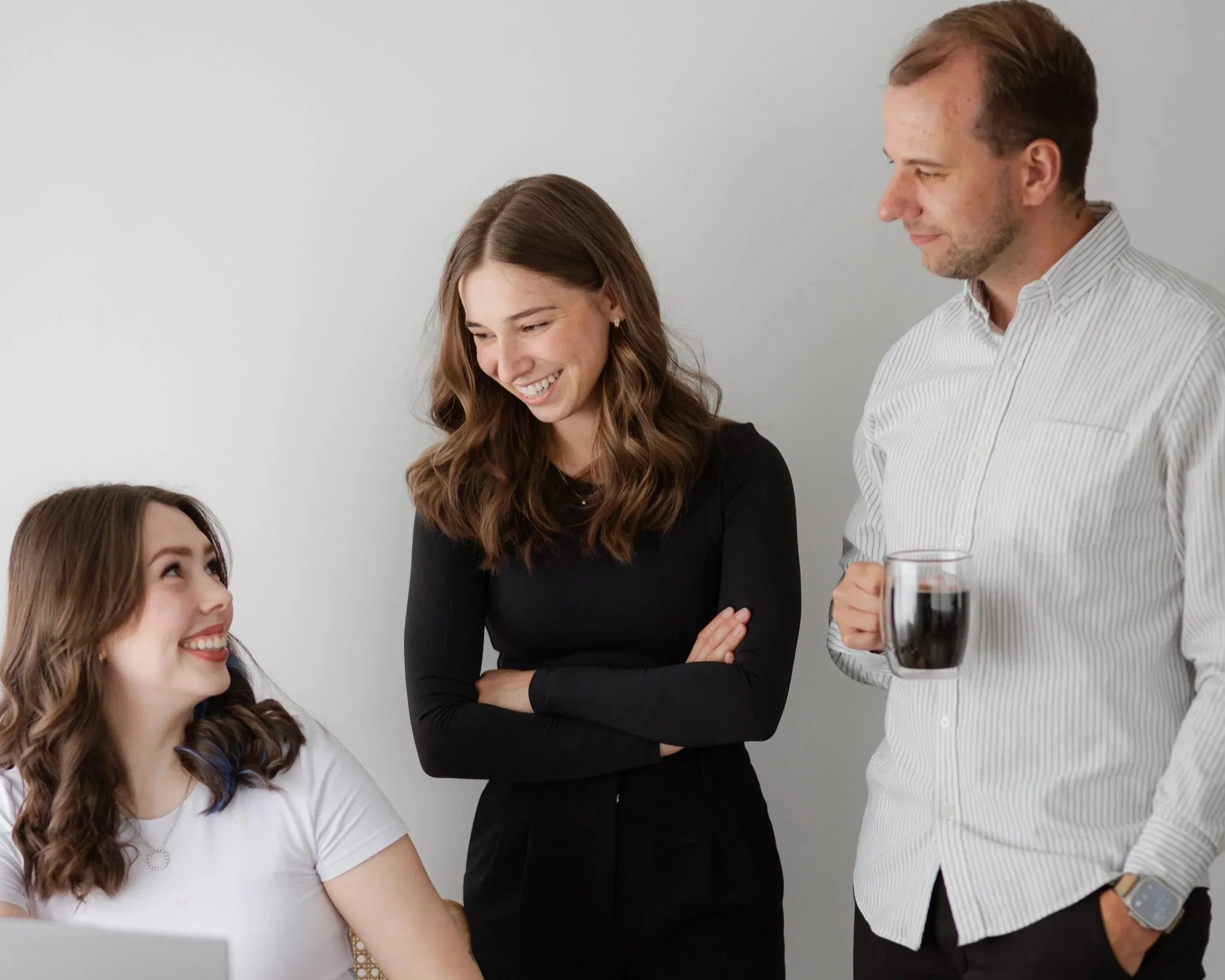 RidgeWood CPA team sharing a laugh together in the office