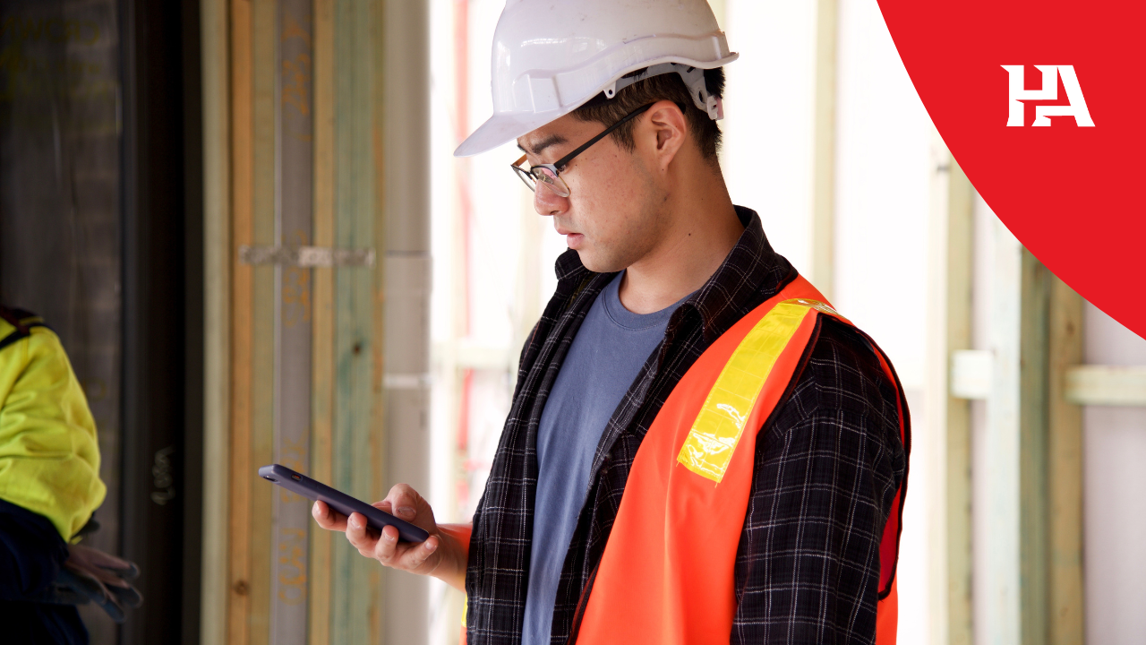 A frustrated construction business owner on his phone with his marketing agency