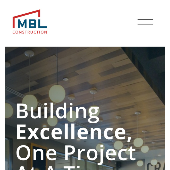 MBL Construction website header with logo, wooden ceiling, round light fixtures, and text "Building Excellence, One Project At A Time."