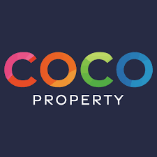 Logo for Coco Property with colorful letters on dark background.
