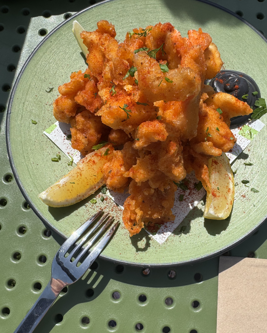 Close up of fritto misto on a green table