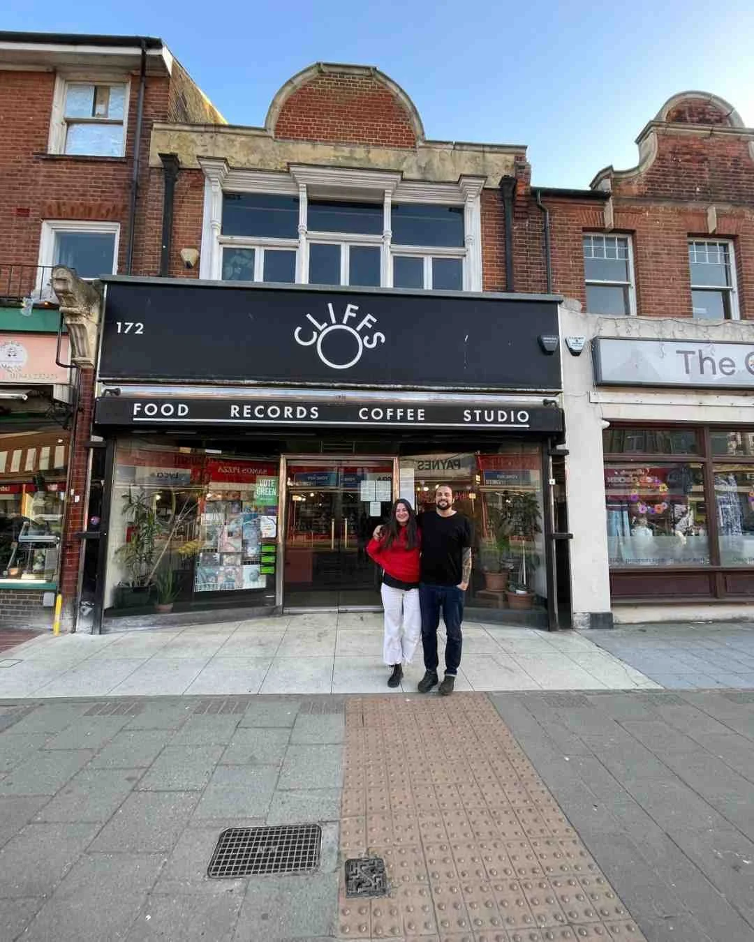 couple in front of a cafe in margate