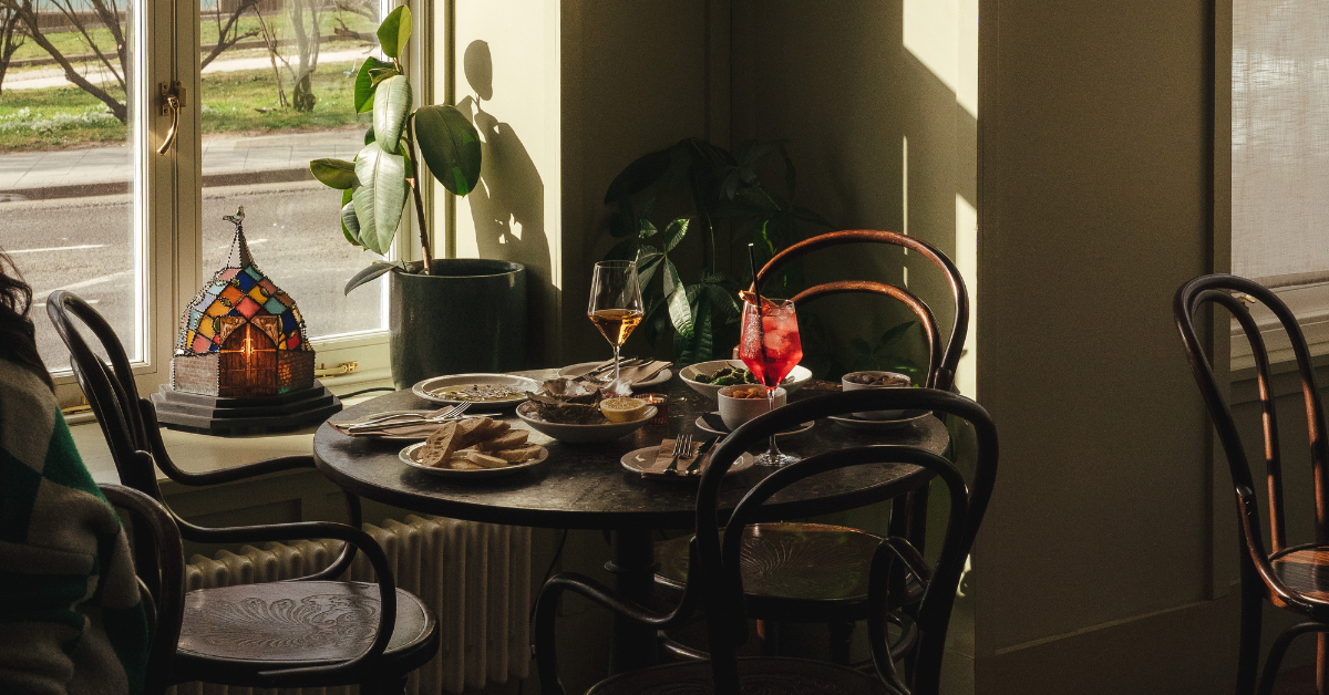 bistro dining table in sunny window in margate